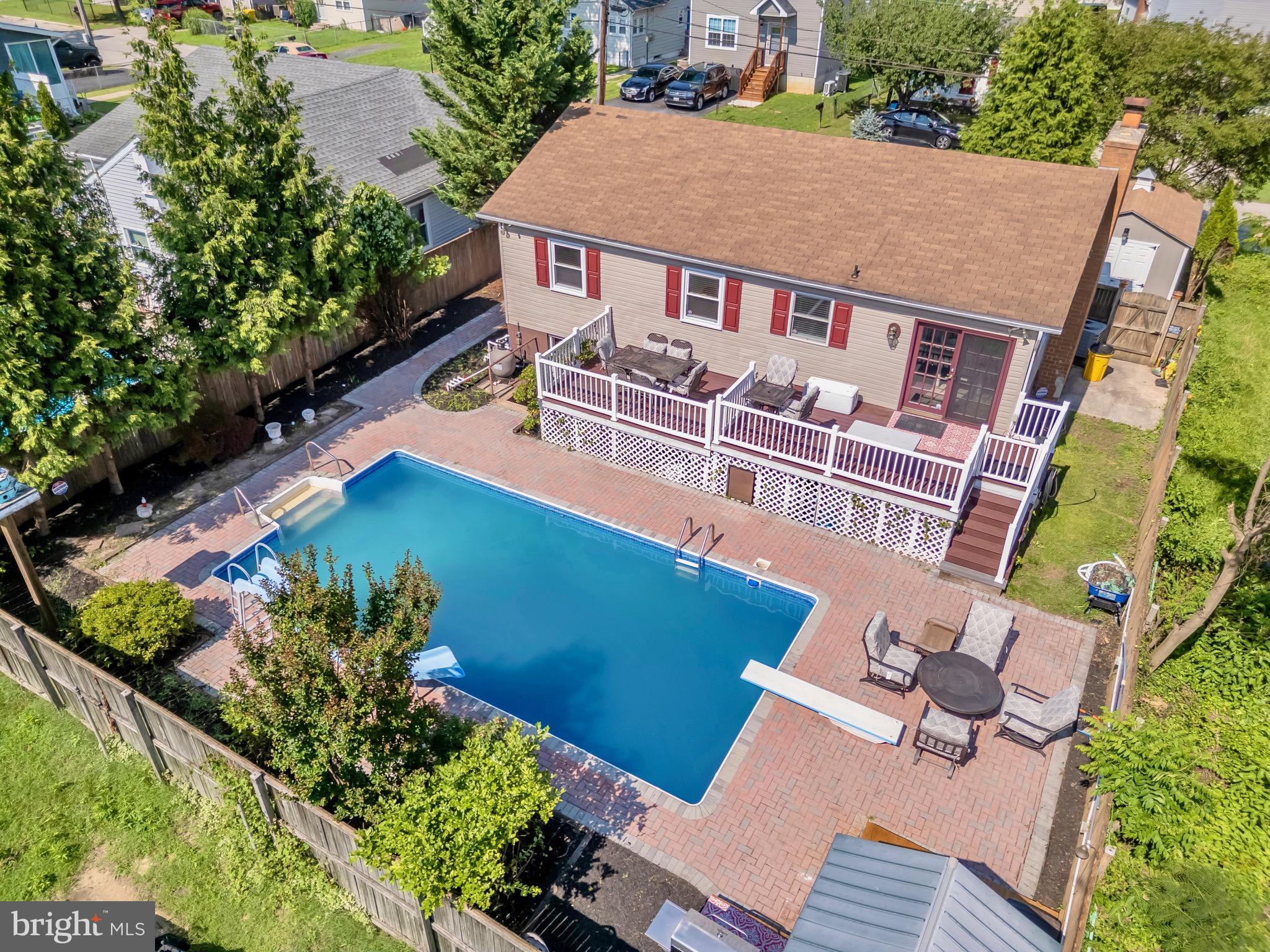 Welcome to 7910 W End Dr — a hidden gem tucked away in the water-privileged community of Orchard Beach. This beautifully maintained ranch-style home offers the perfect blend of indoor comfort and outdoor entertainment, situated just minutes from marinas, parks, commuter routes, and BWI Airport — all without city taxes.
Boasting over 2,000 square feet of finished living space, this home features 4 spacious bedrooms and 2 full baths. The sun-drenched living room is anchored by a classic brick fireplace and gleaming hardwood floors. The large eat-in kitchen offers ample cabinet space and seamless flow to the rear yard—perfect for everyday living or entertaining.
Downstairs, the fully finished lower level adds flexibility with a rec room, office, or guest suite—plus a separate area for storage or a hobby space. But the true highlight is the outdoor oasis: enjoy summer fun in your private concrete in-ground pool, relax on the tiered deck, or entertain guests on the expansive 900+ sq ft brick patio. A large fenced yard, mature landscaping, and a detached shed complete the scene.
Additional features include updated windows, public water and sewer, and off-street parking. Nestled in a quiet neighborhood with a strong sense of community, this property is ideal for those seeking tranquility with easy access to all that Anne Arundel County has to offer.
Whether you're looking for your first home, forever home, or a turnkey retreat near the Chesapeake, 7910 W End Dr delivers charm, function, and lifestyle.