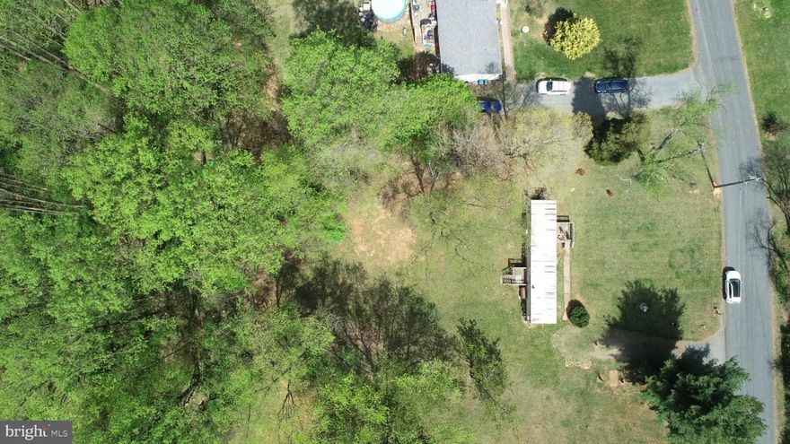 Multiple offers - Highest and best by 8pm on Wednesday 1/28/26 -- Don't miss out!
Perfect blend of cleared land and woods on this .6-acre lot in the heart of Harford County, with an existing well and 1,000 Gallon septic already in place, now for ONLY $90k! This property is ready for your dream home! A perc test has been completed with a passing location! A copy of the septic inspection is attached. A manufactured home currently sits on the lot—no title exists, and it is best suited for demolition or removal. No electricity or running water in the home, as it is not being lived in.