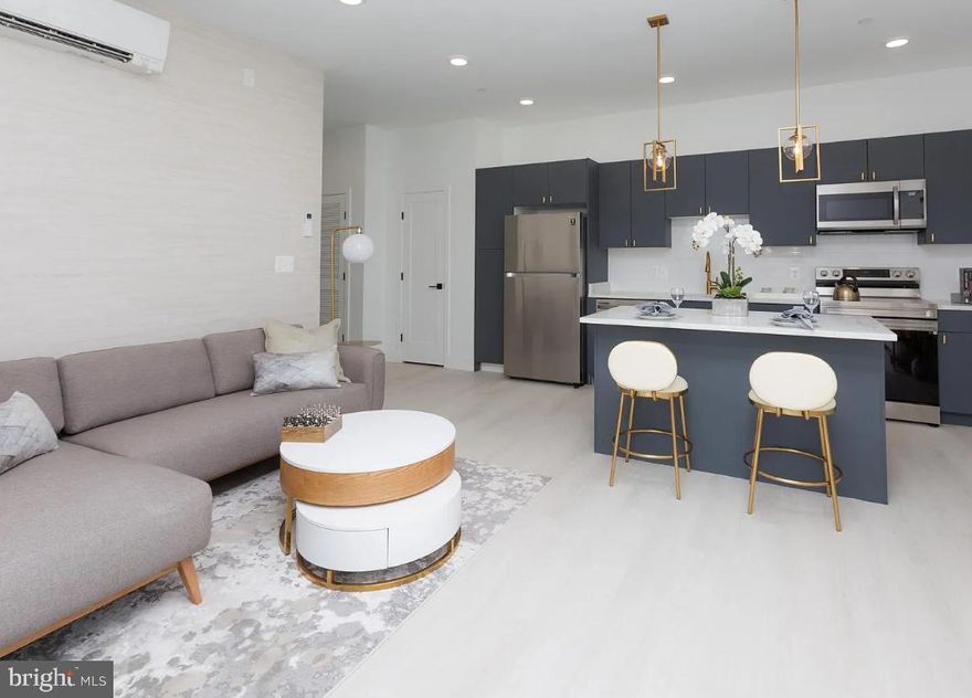 Discover your ideal apartment in The Caroline, where luxury living meets historic charm in the heart of Fells Point. Nestled in this picturesque neighborhood, our stunning apartments offer a refined living experience.

Built in 2022, these new apartments step into open floor plans with soaring ceilings, creating an airy, welcoming ambiance that's flooded with natural light. Your gourmet kitchen, adorned with sleek stainless-steel appliances and black matte hardware, will inspire your inner chef. The custom walk-in closets engineered hardwood flooring, quartz countertops, Philip Jeffries wallpaper, and posh lighting add more than a touch of opulence to your everyday routine.

Welcome to Fells Point, where charming cobblestone streets meet the waterfront. This pedestrian-friendly neighborhood boasts an array of bars, top-rated restaurants, and boutique stores. It's also home to one of Baltimore's most luxurious hotels, The Pendry. Explore historic streets, savor a lively culinary scene, and immerse yourself in the rich history and vibrant culture of this unique Baltimore neighborhood.

Your oasis at The Caroline awaits and we are ready to help you find your dream apartment!

Please note that the photos are of a model home at The Caroline; however, the Matterport show the actual apartment home.