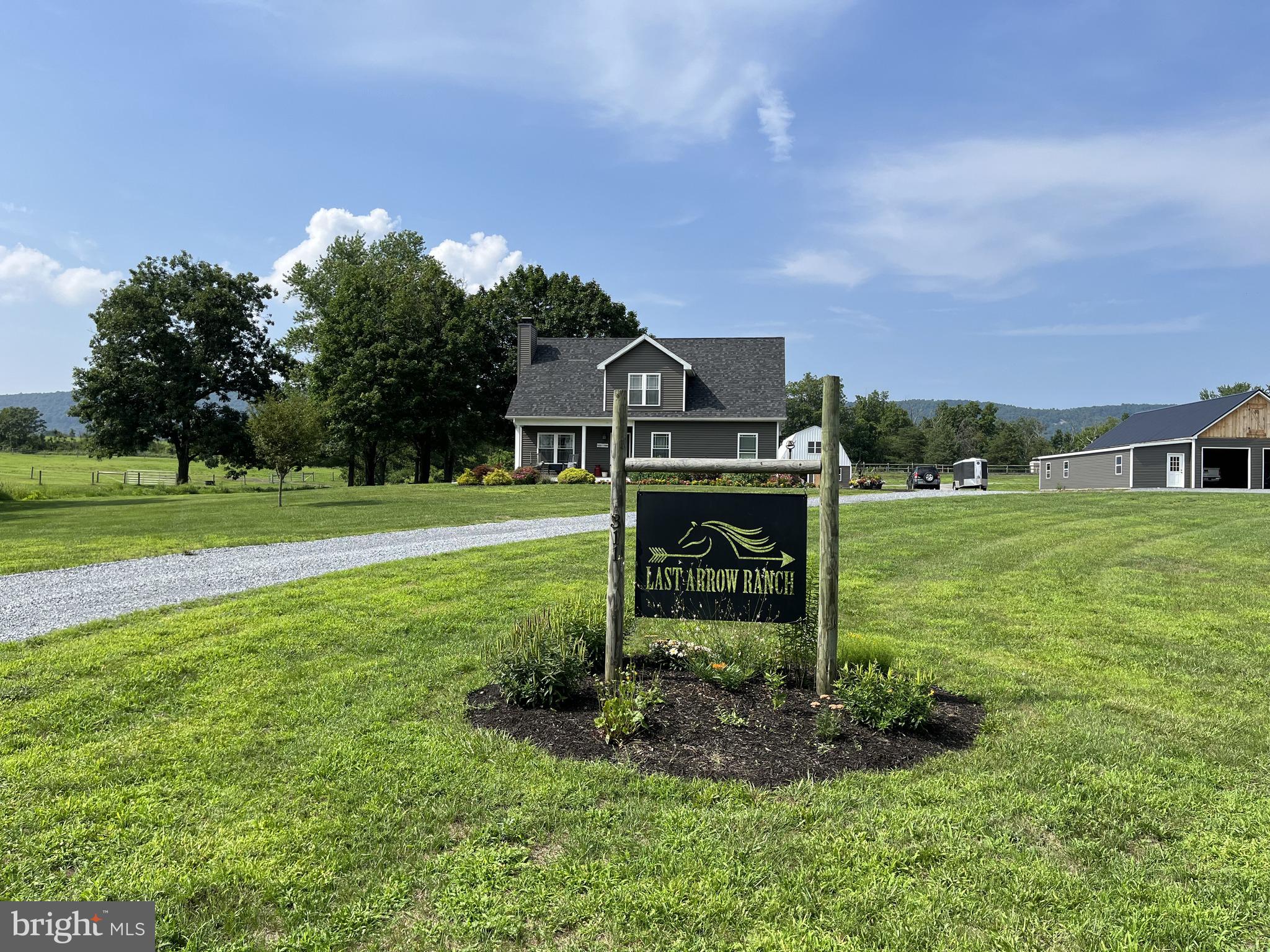 A unique farm ready for your dreams to become reality! The home on this beautiful 22 acre property was originally built in 1957 then rebuilt by the current owner in 2016 with mature trees and lawn. This home offers three bedrooms, two baths, an eat-in kitchen, family room, central air conditioning, electric heat pump used as backup to the warmth the woodstove insert fireplace provides.
With a five stall horse barn (and options to expand), 8 acres fenced pastures (including 4 stall run-in), an outdoor riding ring, riding/walking trails, this property is ready for your equine program! This property also offers a pavilion, large garage/barn ready for your vision to come to life! Enjoy the peace and beautiful sunsets this serene property offers!
