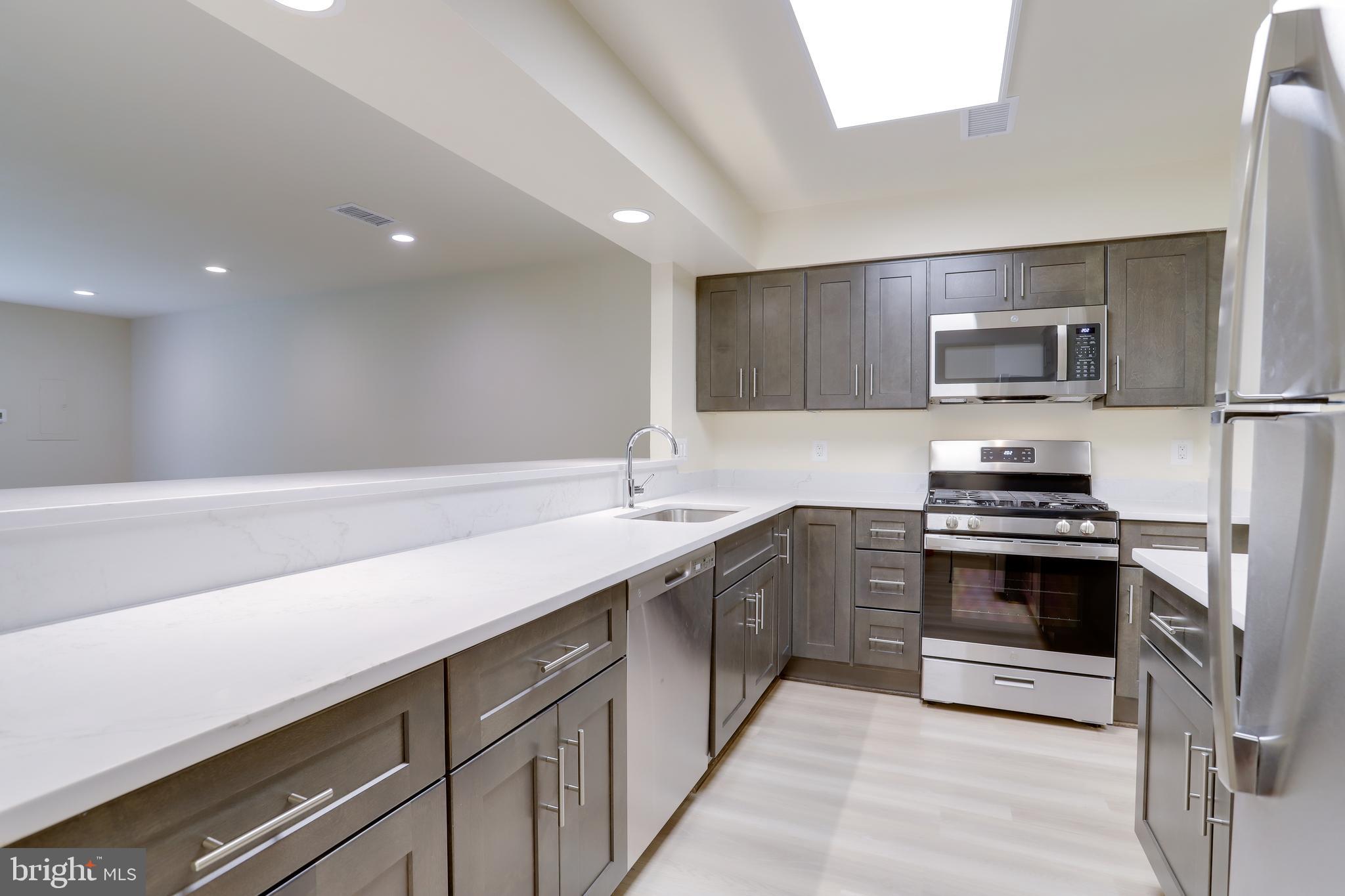 Fully Updated! 2 level, 3 bedroom, 2.5 bathroom, all brick townhouse style condo. Unit has patio in the rear that overlooks green space and woods. Available 7/21/25