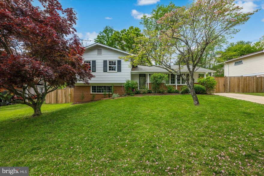 There is a room and a space for everyone. The main level is perfect for entertaining, with its updated kitchen, dining room, and spacious living room.  The rear deck is perfect for gatherings and grilling.  The upper level includes a light-filled primary bedroom with an on-suite bath and two additional bedrooms for family, guests, or an office.  The walkout level is perfect for a family room, playroom, or just relaxing.  The fourth bedroom includes a separate side entrance and an adjacent full bath.  The bonus basement space is perfect for a gym, office, or additional storage.  Walk to the Painted Branch Trail and MLK Park, minutes to shopping, restaurants, and groceries.