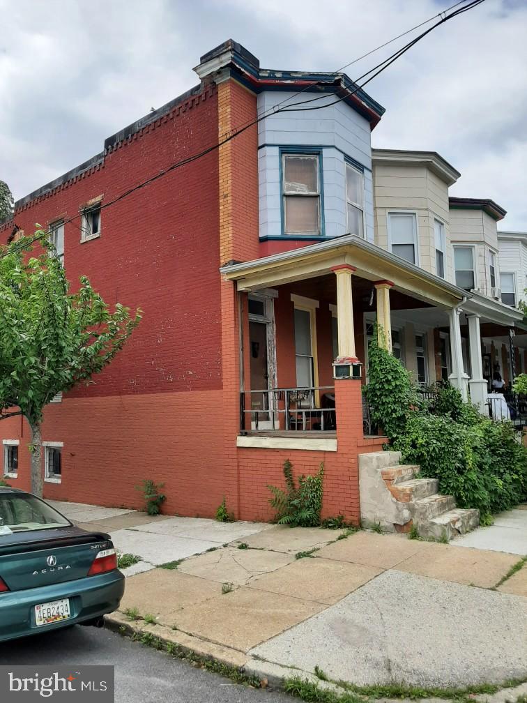 Classic end-of-group rowhome in historic Charles Village offering 1,244 square feet, 3 bedrooms, and 1 full bath, presenting a fantastic opportunity to customize or invest. Updates within the last 8 years include hot water heater, roof, downspouts, furnace, and breaker box with 220 amps (awaiting connection to the outside pole). Ideally located just minutes from the Saturday farmers market, Peabody, grocery stores, restaurants, and cafes, this home is brimming with possibilities! Cash or rehab