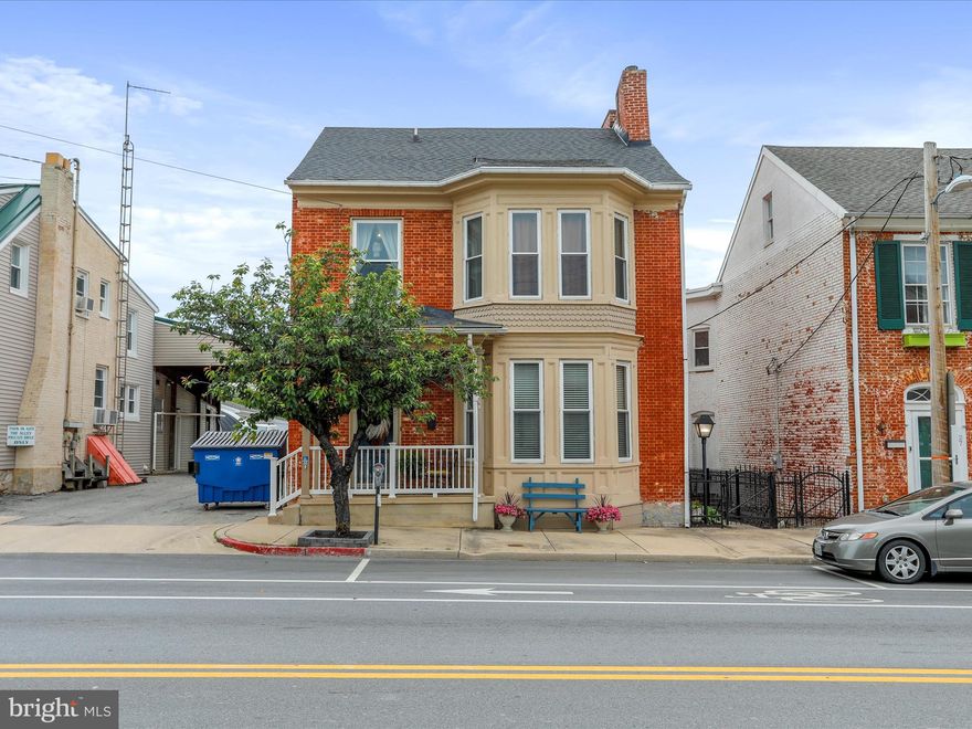 Mixed use w/ commercial capabilities! 10+ SPACE DETACHED, BRICK GARAGE that has recently been used to host private parties; however,  this flex space would be fabulous as a garage, dance studio, or meeting spot! Could this be your next home, Airbnb, or investment opportunity? The possibilities are endless AND the home is listed BELOW appraised value! The current owners have loved seeing this downtown Williamsport home come to life and now it's your turn to make the next move! Although it is currently used as a primary residence it was previously used as a mixed use building with a shop on the main level! This home has also been the host to Christmas carriage rides!  The home has gone through major renovations in the last 10 years to include an updated kitchen and baths (with exception of 1), window (most) replacements, metal garage roof, custom paint colors, and finished attic space! The home has two welcoming options for primary bedrooms with attached full baths! The main level features high ceilings, 2 fireplaces (not currently in use) and a grand entrance complete with designer choice wall paper imported from the UK!  The rear yard acts as a private oasis with a covered deck and partial privacy fence! Allow Williamsport to become your local outdoor playground with access to the C&O Canal and Cushwa Basin, Potomac River, Conocheague Creek and Byron Memorial Park! This town is loved for its cycling, jogging, hiking, biking, fishing, kayaking and boating opportunities! Minutes to I-81 and I-70!  THIS HOME COULD BE ELIGIBLE FOR TAX CREDITS FOR DIFFERENT TYPES OF RESTORATION AND ALSO A FEDERAL  TAX CREDIT FOR INCOME PRODUCING PROPERTIES