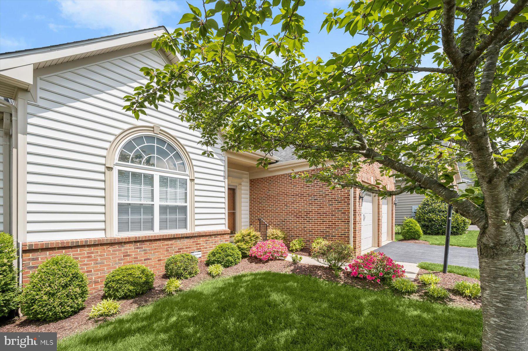 Major price improvement! Welcome to this beautiful, lovingly cared for home in a 55+ active, adult community on a premium lot. The main level has all you need. And also, if you want the option to entertain family and friends, you have the space to do it! Large fully finished basement (which can be used for extra storage as well), paver patio and deck! Close to so many wonderful quaint shops, restaurants, etc in downtown Frederick and New Market. Walking trails at Lake Linganore, wineries, near mountains and beautiful scenery, not to mention all the great amenities at the clubhouse in the neighborhood!! Arguably, one of the nicest lots in the neighborhood! With the primary bedroom en suite on main level, as well as main level laundry, and large two car garage, this one is sure to please. There is hard wood flooring throughout most of the main level and gorgeous newer carpet on the upper level. The kitchen boasts quartz countertops, all SS appliances, microwave is also convection oven, newer backsplash, pullout drawers at the island w/sunroom off kitchen and deck views to private wooded area! Primary bedroom/bath has two huge walk in closets! Second and third bedrooms also have walk in closets, an extra huge storage area off the loft... there is SO MUCH closet space and storage in this home! The expansive lower level offers a bonus room/den/office/media or exercise room as well. There is a sprinkler system for extra convenience in yard upkeep. Both exterior slider doors are new, water heater new in 2023, and condo covers roof repairs and maintenance. Lower level family room walks out to paver patio and backs up to complete privacy. Also, New Market and downtown Frederick have so much to offer. With this new price, this shouldn't last long so schedule a showing today!!