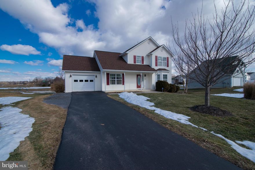 Shows Like NEW! Backs to farmland! 4 BR, 2.5 BA Colonial with Full, Partially Finished Walkout Bsmnt & 3-pc rough-in. MBR BA w/Soaking Tub, Sep. Shower, Walk-in Closet. Living Room with Bay Window, Formal Dining Room, Country Kitchen with TONS of cabinets! Spacious Family Room Opens Onto 8' x 12' Deck. Gleaming hardwoods on main level. 1-Car Garage, Roomy 25 x 4 Covered Front Porch. Won't last!