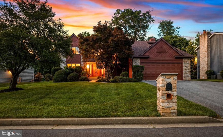 This meticulously maintained and pristine stone and cedar contemporary home situated near the end of a cul-de-sac offers a desirable circular floor plan with a great flow, expansive  gourmet kitchen and warm gathering spaces on a nearly half-acre lot.  It features a gorgeously renovated eat-in kitchen with stainless steel GE Cafe appliances, granite counters, abundant KraftMaid custom cabinetry space, tile backsplash and double pantry that easily hosts your weeknight dinners and special occasion parties. The inviting family room features an attractive marble finished fireplace; the owners' suite boasts two walk-in closets and a luxury bath with Jacuzzi jet tub, stall shower and Thomasville vanity cabinet with Kohler sinks. The fully finished walk-out lower level provides generous flex space for your specific lifestyle needs: gaming, exercise, studio, office or guest space plus a full bath and plenty of storage. You'll adore morning coffee and weekend bbqs on the fabulous rear deck that overlooks the flat tree lined rear yard. Roof replaced in 2023.  Make this magnificent property yours!