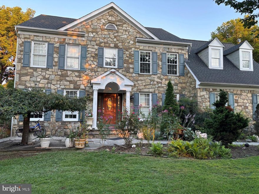 Welcome to 19105 Peach Blossom Court, a timeless Craftsmark-built home located in the established Cypress Run community. This spectacular stone-front colonial is gracefully positioned on over two acres at the end of a quiet cul-de-sac. Inside, the home features a spacious open floor plan filled with natural light, enhanced by vaulted ceilings and skylights throughout. The heart of the home is a large gourmet kitchen complete with a central island, custom cabinetry, granite countertops, and an adjacent sunroom that invites warmth and relaxation. French doors lead to an oversized deck, ideal for entertaining or unwinding while overlooking the expansive, level backyard.

The main level offers a generous family room with a cozy fireplace, beautifully maintained hardwood floors, and a private library perfect for work or quiet reading. Upstairs, the luxurious master suite includes a spa-like bathroom, a comfortable sitting area, and a large walk-in closet. The finished attic adds even more living space with an additional bedroom and full bathroom, providing flexibility for guests or hobbies.
Downstairs, the fully finished basement boasts a wet bar, multiple bonus rooms, and ample storage space. The side-load garage and extended driveway offer plenty of room for multiple vehicles, making this home as practical as it is elegant. With its classic charm and modern amenities, 19105 Peach Blossom Court is a rare find in a sought-after neighborhood.