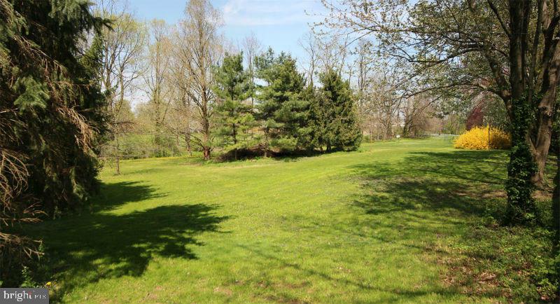 Flat lot open to any builder, Very private with mature trees, small stream adds to the beauty, located at end of Cul-de-sac on the right. Fully prepared plot plan an approved with the township. Call today to discuss having our builders price out a complete home.