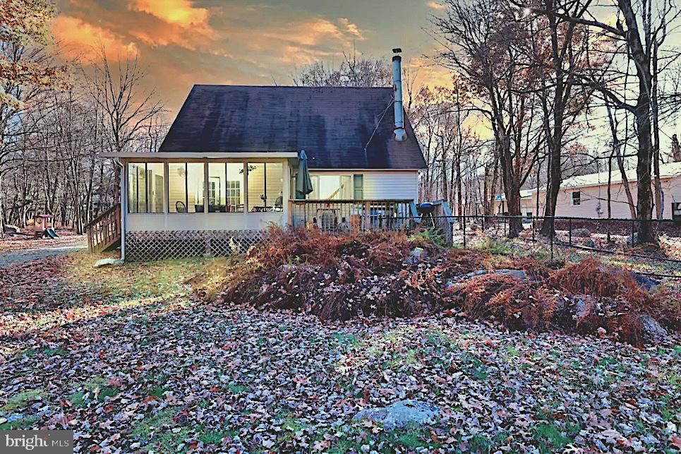 Discover the perfect fusion of timeless charm and modern ease in this fully furnished, turnkey 3-bedroom, 2-bath Cape Cod retreat—beautifully renovated and ready for immediate enjoyment. Tucked away in the picturesque Towamensing Trails community, this versatile property offers a cozy haven for couples, a relaxing escape for small families, or a lucrative short-term rental when not in personal use.
Inside, you'll find a spacious living room ideal for hosting guests, a serene sunroom crafted for quiet moments, and a generous deck built for grilling and outdoor gatherings. Convenience is key, with a first-floor bedroom and laundry area simplifying daily routines. Notable upgrades include a brand-new roof (2024), a rebuilt rear deck (2019), and a comprehensive renovation in 2019 that refreshed the kitchen, bathrooms, and flooring throughout.
Towamensing Trails elevates the lifestyle with its impressive amenities: a pristine 190-acre lake with a sandy beach, volleyball courts, playgrounds, a swimming pool, a vibrant community center with a game room, and even a private restaurant and bar. With nearby attractions just a short drive away, this home is a standout opportunity for both living and investing.