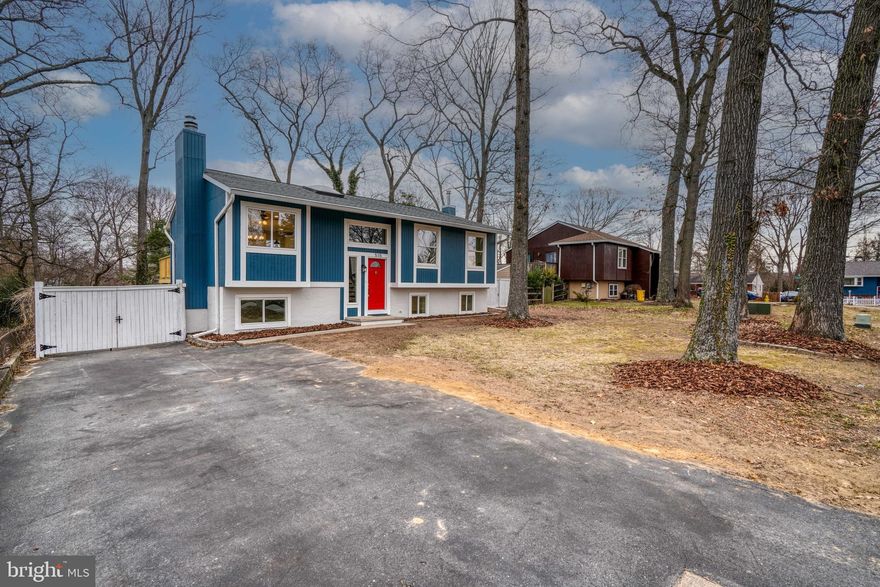 THE LIST PRICE REPRESENTS THE OPENING OFFER AMOUNT.
Welcome home to Magothy Forge community! Move right in with this completely renovated split
foyer. Designer updates throughout this 4-bedroom home with 3 full bathrooms. You'll
immediately appreciate the bright open floor design, fresh designer new paint and waterproof
flooring on the main floor. Open concept main living level with bright, sun filled rooms. A chef
inspired kitchen offers stainless appliances, high end back splash, quartz counters, and a large
center island with seating. The primary bedroom suite is sure to please with its large size, dual
closets, private bathroom with tiled shower. Two additional bedrooms and tiled bathroom on
same floor. The lower level offers more living space with a bonus family room, large bedroom,
newly completed full bathroom with plenty of storage throughout the home. Private rear yard
with a newly built large deck. This home is fully renovated with a new architectural shingle roof,
updated electric and plumbing. Ample parking with a large driveway extended into the rear yard.
Close to shopping, dining & entertainment with easy commuter access. Schedule your tour to
view this home today. This home is in the Chesapeake school district.
Offers will be accepted through Monday, March 11, 2024 at 1:00 pm. 
  
AT SELLER'S DISCRETION, AN OFFER MAY BE ACCEPTED AT ANY TIME.