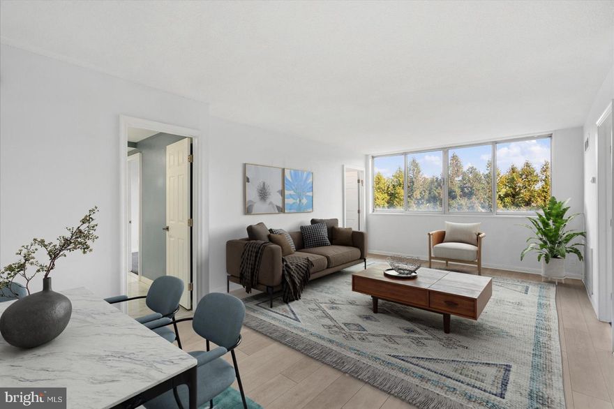 Make this your new home for the new year! Move right in to this beautifully renovated 2-bedroom, 1-bath condo with modern comfort and convenience in a secure, well-maintained building with a front desk attendant at Park Towers East in Upper Park Heights. This light-filled condo features a sleek gallery-style kitchen with new stainless-steel appliances, new luxury vinyl plank flooring, a spacious open-concept living and dining area, and two generously sized bedrooms. Enjoy the comfort of move-in-ready upgrades throughout. Recent improvements include the added second bedroom and exterior masonry refurbishment to the condo building for a refreshed look. Ideally situated near both city and county amenities with quick access to major highways, shopping, dining, and public transit.