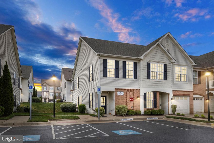 Gorgeously upgraded Colonial Forge Condo! Nothing left to do but move in! New hardwood flooring and carpet throughout the main living areas, 9+ foot ceilings, and abundant natural light. The open floorpan is great for entertaining and the kitchen does not disappoint. The elongated cabinetry has upgraded finishing and plenty of room for all your kitchen appliances and utensils. The kitchen also boasts stainless appliances and a large island with room for stools. The dining area has room for a large table and overlooks the nicely sized family room with patio access. Both bedrooms have carpeting, ceiling fans, and their own respective bathrooms. This condo also has an attached one car garage with a new garage door opener and driveway space. Walking distance to Colonial Forge High School and great community amenities to include the outdoor pool, tot lots, and dog park. Minutes to the new Embrey Mill Town Center and Jeff Rouse Swim and Sport Center. Lawn care and water/sewer are included in the condo fees!