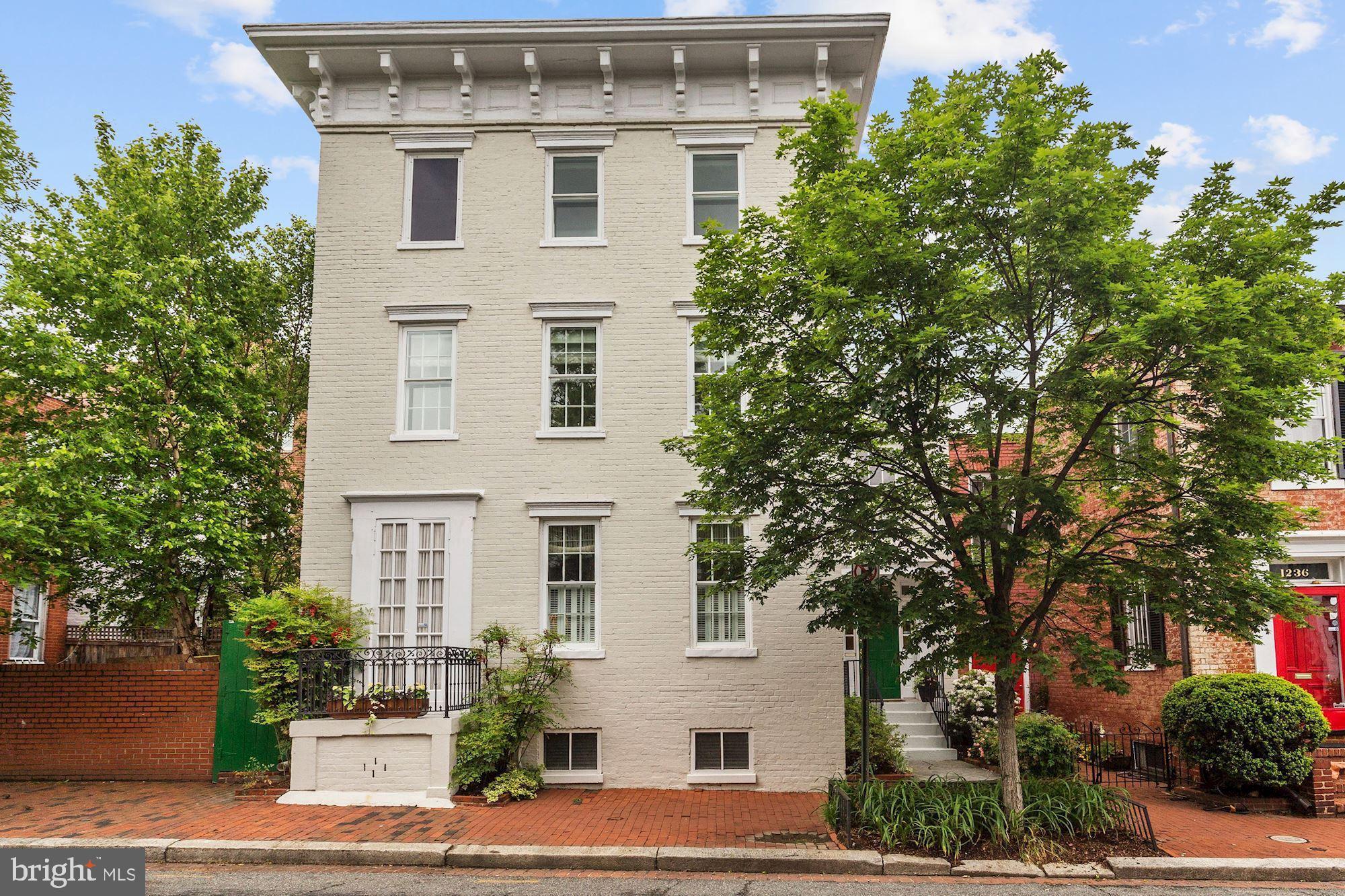Large historic house in the West Village! The original part of this versatile house dates to 1790. The main level includes a spacious foyer, living room with fire place and built-ins, dining room, gourmet kitchen that opens to the family room, a light-filled second informal dining room, and a second entrance used for a mud room and storage, as well as a powder room and laundry. The second level Includes the master suite with a spectacular dressing room and bath. There is stunning room with high ceilings that makes a wonderful bedroom/library/playroom that walks out to the lush and landscaped private garden. There is another bedroom, bath and office/bedroom on this level. The top level is a bedroom and bath with views on three sides. The lower level is a rec room, storage & cedar closet. There is 2-car rental parking in a garage just 30 feet from the front door.