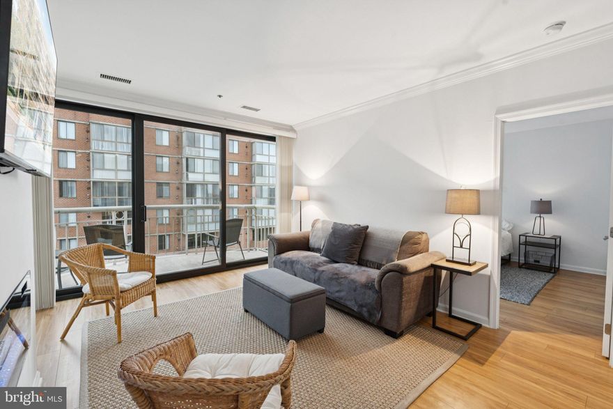 Welcome home to this rare top-floor condo with soaring 9’ ceilings and abundant natural light! Step inside and you’ll immediately appreciate the thoughtful updates and attention to detail. The kitchen boasts granite counters, stainless steel appliances, and beautifully maintained cabinetry, while the open living area offers a cozy electric fireplace (low-maintenance and heat-producing) and fresh finishes throughout.  The spa-like bathroom, fully renovated in 2021, features a frameless glass shower, modern vanity, and designer tile. Additional upgrades include like-new engineered flooring, crown molding, dimmer switches, and custom window treatments. The bedroom offers a walk-in custom closet system and room-darkening blinds for comfort and privacy.  For peace of mind, major updates have already been completed: new bedroom window (2024), balcony door/window (2025), and a high-end Bosch HVAC system (2023). Step outside to your private balcony perfect for relaxing, entertaining, or even grilling. The home also comes with an included wall mount Samsung TV.  With garage parking and the Metro just two blocks away, this condo combines style, comfort, and unbeatable convenience. Everything feels brand new… simply move right in and start enjoying!