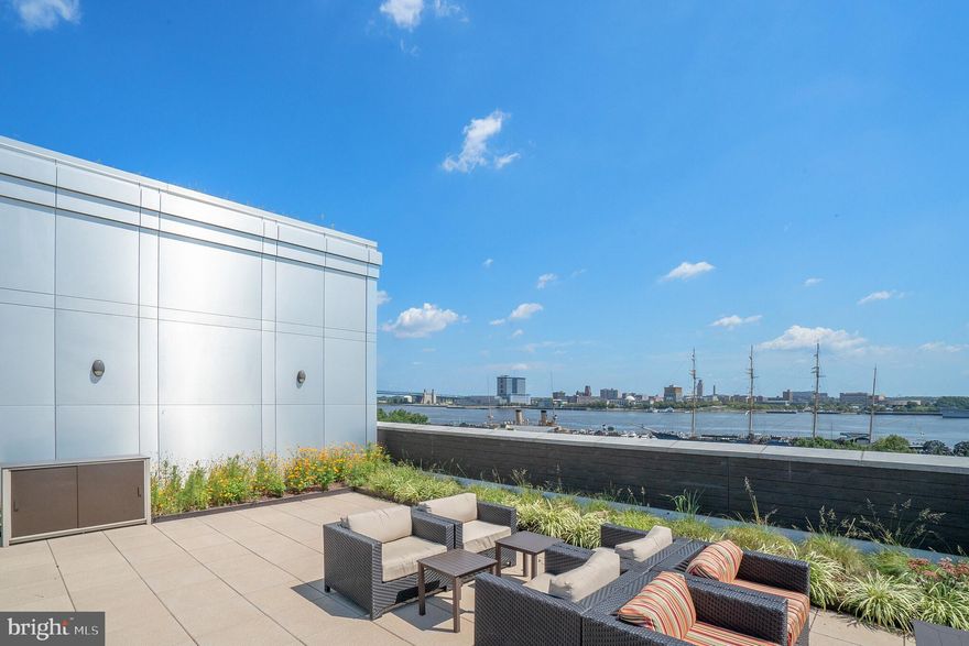 An exquisite opportunity to live in a sprawling four bedroom, three and a half bath residence with three private balconies and two-car garage parking. This home offers over 2,400 square feet of magnificent living space. The expansive living and dining areas impress with soaring ten foot ceilings, gleaming hardwood floors, and oversized windows that flood the interior with an abundance of natural light. The living room opens to a private balcony, perfect for entertaining, relaxing, or enjoying your morning coffee. The chef’s kitchen is a culinary masterpiece showcasing an oversized island with a breakfast bar, rich quartz countertops, a marble subway-tile backsplash, and Gaggenau professional stainless steel appliances. The lavish primary suite is a private retreat with custom built-ins, touch-sensor lighting, a large custom walk-in closet, and a spacious balcony. The spa-like marble bathroom offers double ceramic sinks with storage vanities, a soaking tub, and a separate shower with a frameless glass enclosure. The second bedroom is impeccably appointed and features an en suite bathroom and generous closet space. The third bedroom is filled with natural light and offers a private balcony, multiple exposures and ample closet space. The fourth bedroom leaves room for the imagination with the ability to be used as a guest room, home office, media room, playroom, workshop, or library. Two garage parking spaces with inside access, custom window treatments, thoughtful built-ins, and a multitude of designer finishes complete this impeccably maintained residence at 410 at Society Hill. Association amenities include a 24-hour concierge, residents’ lounge, central courtyard with seating areas, bicycle storage, and a coveted rooftop deck with breathtaking 360- degree views. Perfectly nestled in the historic Headhouse District of Society Hill, this pet-friendly residence is just steps from fine dining, one-of-a-kind shopping, world-renowned cultural destinations, vibrant nightlife, and major transportation.