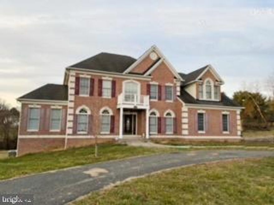 Don't miss this solid brick home with charm and magnificence in Ridgefield Farm. This home, which is located in a  scenic 1.89 acres lot on a quiet cul-de-sac, features  decorative arches and moldings, high ceiling , oversize windows, formal living room and dining room , stylish updated kitchen, spacious bedrooms and full baths.