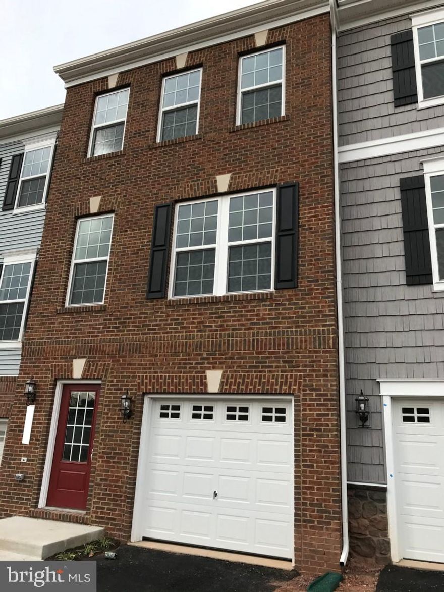 This is a new three level townhouse. Looking for one tenant to occupy a master bedroom on the top level. Bedroom 1 is 14'7" x 12'5" with private bathroom (standing shower). Bedroom 2 has a male tenant. Owner occupies the lower level and garage. The main level (great room, kitchen, and dining area) will be shared. The main level will be semi-furnished (i.e. dining furniture, cookware, flatware, and dishes), but the bedroom will be unfurnished.

Rent does not include utilities (water, power, and wireless internet) and will be split evenly (approx. $90ea per month). Each room has a cable connection. FiOS is free on a personal device, but to watch it on a TV in your room, you'll have to rent the FiOS box at your expense (approx. $12/mo).

There is free parking on both sides of the townhouse and throughout the community. The community has two gazebos, small parks and a pond with a walking trail. There are also nearby jogging trails. The community is located minutes from the hub of local conveniences along Center Street in Old Town Manassas, as well as Hastings Marketplace and The Shops at Signal Hill. This location is a short drive to Route 28, Route 234, Prince William County Parkway and I-66. The primary grocery stores are Giant, Harris Teeter, Lidl, and Walmart.