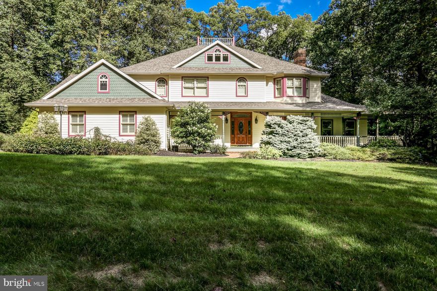 Step off the wrap-around porch as you stroll to the walking trails of Rocky Ridge Park enjoying the quiet countryside, yet live close to all amenities.  5 Bedrooms 4 Full Baths this expansive spacious home boasts interior features of exceptional architectural detail; hardwood flooring, crown molding, stained glass windows, custom plantation shutters   custom millwork throughout.  Chef's eat-in Kitchen with granite. Level 2 Master Suite with Full Bath, his-n-her walk-in closets, 4 spacious bedrooms. The lower level is finished with a Family Room and Rec Room, complete with Fireplace.  There is a vast amount of storage in this beautiful home.   Amazing private yard. Central School District