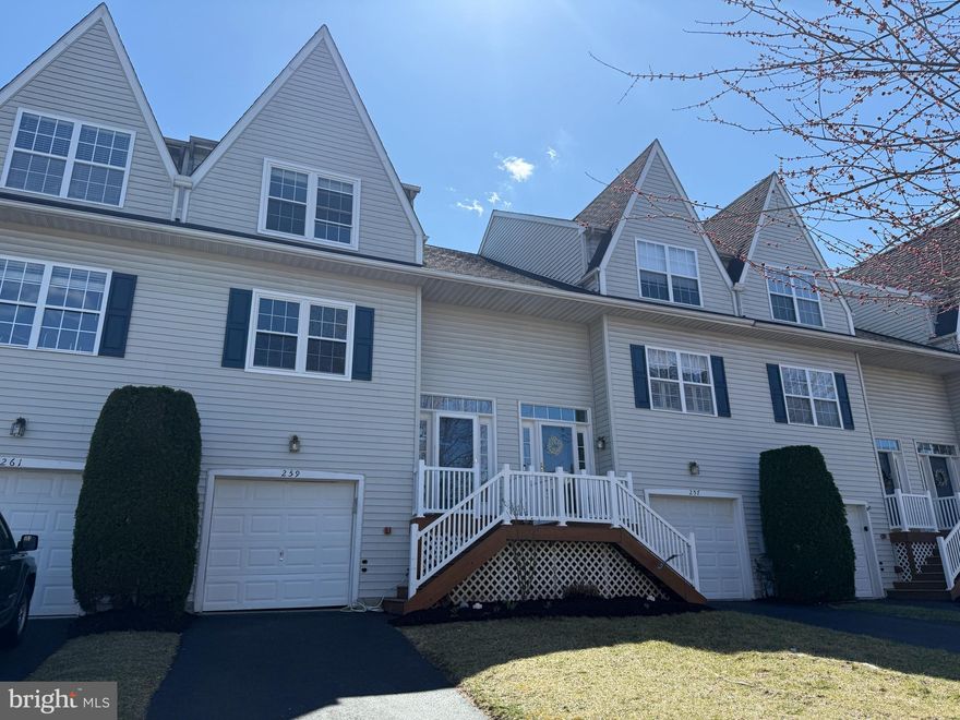 Unlock the possibilities with this spacious townhome, ready for your personal touch to transform it into your dream home. Offering generous living spaces and modern features, this property combines comfort and convenience in one inviting package. Step inside to find a bright and airy main level featuring soaring 9+ foot ceilings, recessed lighting, and a 3-panel sliding glass door that leads to your private rear deck. The kitchen boasts sleek newer stainless steel appliances still under warranty with an induction cooktop stove and stylish two-tone upper and lower cabinets. A reverse osmosis water system at the kitchen sink allows for fully filtered drinking water any time. A convenient powder room completes the main floor. Upstairs, the primary suite offers a peaceful retreat with two spacious closets and an ensuite bathroom featuring a double bowl vanity. Two additional bedrooms share a full hall bathroom, providing ample space for family or guests. The lower level presents even more living space, ideal for a family room, home office, or workout area. This level also includes access to the attached garage and a walkout to the rear patio. Enjoy upgraded windows and sliding doors throughout. With a little cosmetic TLC, this home has the potential to shine. Don’t miss the opportunity to make it your own!