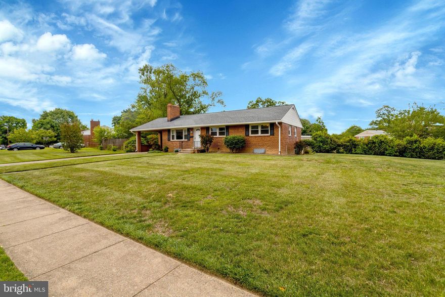 Move-in ready and beautifully updated throughout, this all-brick Lincolnia Hills rambler is tucked onto an oversized 0.32-acre corner lot where the streets quietly come to an end — a peaceful, low-traffic setting just minutes from DC. Step inside to a sun-filled main level featuring gleaming, refinished white oak hardwoods, open living and dining rooms, and a kitchen with a gas stove and clever rollout shelving. Three comfortable, freshly painted bedrooms and two stylishly remodeled bathrooms (2021) round out the main floor. Downstairs, the fully finished walkout lower level adds incredible flex space: a cozy knotty-pine family room with brand-new carpet and flooring (2026), built-in wine racks tucked beneath the stairs, a dedicated home office, a full bath, and a full laundry room — perfect as a private guest suite, home office wing, or entertainer's retreat. Step outside to a fully fenced backyard with a shed and a whole-lot invisible fence system (two collar units convey) — a private outdoor oasis ready for morning coffee or evening gatherings. The big-ticket items are already done: roof (2018), gutters (2022), double-pane windows (2012, pet screens 2021), Lennox gas furnace and central AC (2011, new fan motor 2025), Rinnai tankless hot water heater, gas-log fireplace, and a fully waterproofed basement. This home is tucked into a friendly, walkable community with an unbeatable commuter location — minutes to DC, the Pentagon, Mark Center, Arlington/Amazon HQ2, Old Town Alexandria, and the exciting new WestEnd Alexandria redevelopment.