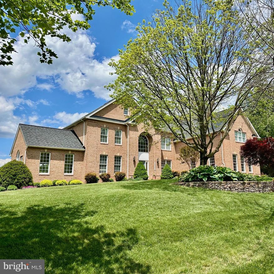 SHOWINGS BEGIN FRIDAY 5/16 HOPING FOR A SUNNY DAY FOR ADDITIONAL EXTERIOR PHOTS AND TOURS****ABSOLUTELY STUNNING TOLL BROTHERS "STRATFORD WILLIAMSBURG" MODEL SITED ON ONE THE MOST GORGEOUS LOTS IN HOWARD COUNTY!!** THREE FINISHED LEVELS** DRAMATIC TWO-STORY FOYER W/CURVED STAIRCASE** OPEN TWO-STORY FAMILY ROOM ADJACENT TO BREAKFAST AREA & KITCHEN - ALSO INCLUDES A PRIVATE SECOND STAIRWAY TO THE TOP LEVEL** PRIVATE MAIN LEVEL OFFICE / FORMAL LIVING & DINING ROOMS - ALL WITH NINE FOOT CEILINGS**  FLORIDA ROOM ADDITION W/VAULTED CEILINGS (PERFECT PLAYROOM!!)** PRIMARY SUITE WITH DEN AREA / TWO WALK-IN CLOSETS & PRIMARY BATHROOM** THREE ADDITIONAL BEDROOMS & TWO FULL BATHROOMS ALSO ON THE TOP LEVEL** FINISHED WALKOUT LOWER LEVEL INCLUDES BEDROOM #5 / HUGE REC ROOM W/HOME THEATRE EQUIPMENT / GAME-INDOOR PICKLEBALL PRACTICE ROOM & AMPLE STORAGE*** THREE CAR SIDE-LOAD GARAGE INCLUDING TESLA CHARGER*** RECENT UPDATES INCLUDE... 50 YR SOLAR INTEGRATED ROOF / HVAC UNITS LOWER & UPPER LEVELS / GENERAC GENERATOR / POOL HEATER / GE CAFE COOKTOP - DOUBLE WALL OVEN - DISHWASHER - MICROWAVE & TRASH COMPACTOR!!!  HOME SHOWS FANTASTIC!!!  BONUS... THE HOME SIDES TO A NON-BUILDABLE LOT ON ONE SIDE / IS SITED PRIVATELY FROM THE HOME ON THE OTHER SIDE & BACKS TO COMMUNITY OPEN SPACE & FARMLAND!!  A++