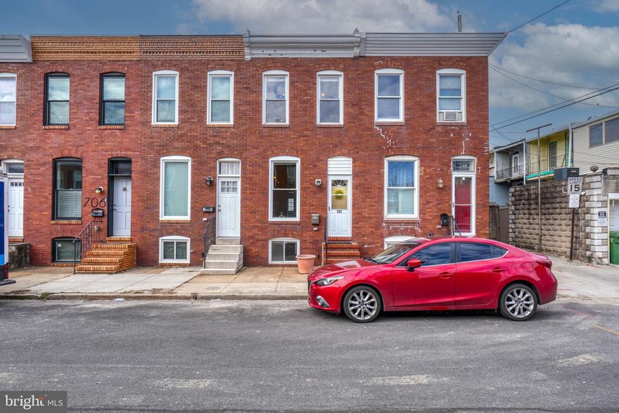 Amazing Brewers Hill home full of character! You will be WOWED immediately by the quality and features offered - Bathroom w/ jetted tub, unique spiral stairs, hardwood floors, exposed brick, exposed beams, recessed lighting, open floor plan. Gourmet kitchen w/tile, granite counters, beautiful custom cabinets & newer appliances, Oven/Microwave 2023, Dishwasher 2021. Other updates include, Furnace 2022, AC 2022, Deck 2021, Roof 2018, Water Heater 2021, Front custom window and full interior paint 2024. Walk to dining, shops & waterfront, easy access to major commuter routes.