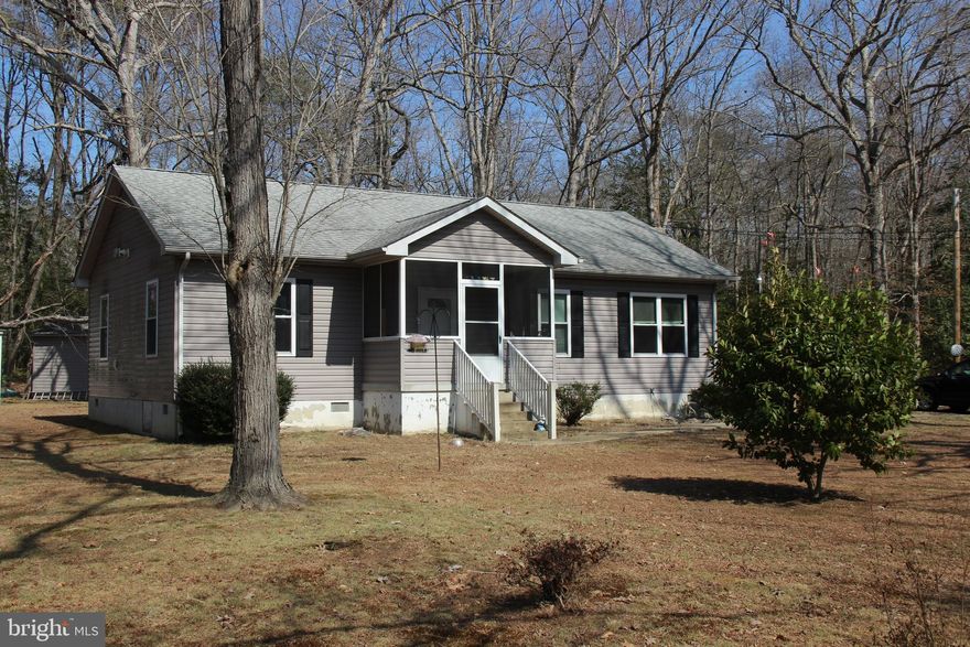 This 3 bedroom 1 bath rambler is located on a 2.01 acre lot. It backs to woods and also on the right side. There is a open feeling when standing in the front yard that also gives privacy due to the distance. The house is handicap equipped with a nice ramp on the side entrance as well as rails and handles in the bathroom tub and large shower.