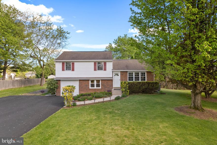 Set on nearly an acre, this 3-bedroom, 2-bath home offers an ideal combination of comfort, convenience, and generous outdoor space for relaxing, entertaining, or gardening. Inside, the home features an easy flow from the kitchen to the dining area and into the family room, all anchored by a cozy gas fireplace. Upstairs, you’ll find three bedrooms and an additional bathroom with tub shower. The lower level offers a bonus living area with a full bathroom that adds flexibility, perfect for a home office, playroom, or additional recreation space. The home offers seamless indoor-outdoor living with convenient access to the deck, yard, and saltwater hot tub, ideal for year-round enjoyment. A nearby side entrance provides quick access to a full bathroom. Thoughtfully updated for peace of mind, recent improvements include a new HVAC system (2025), driveway (2025), renovated bathroom (2025), professional interior painting (2025), exterior oil tank (2021), gutters (2021) and more. A storage shed offers additional functionality and space for tools, equipment, or seasonal items. Ideally situated minutes from Doylestown and close to major commuting arteries, this well-maintained property offers practical updates, functional living space and exceptional outdoor versatility.