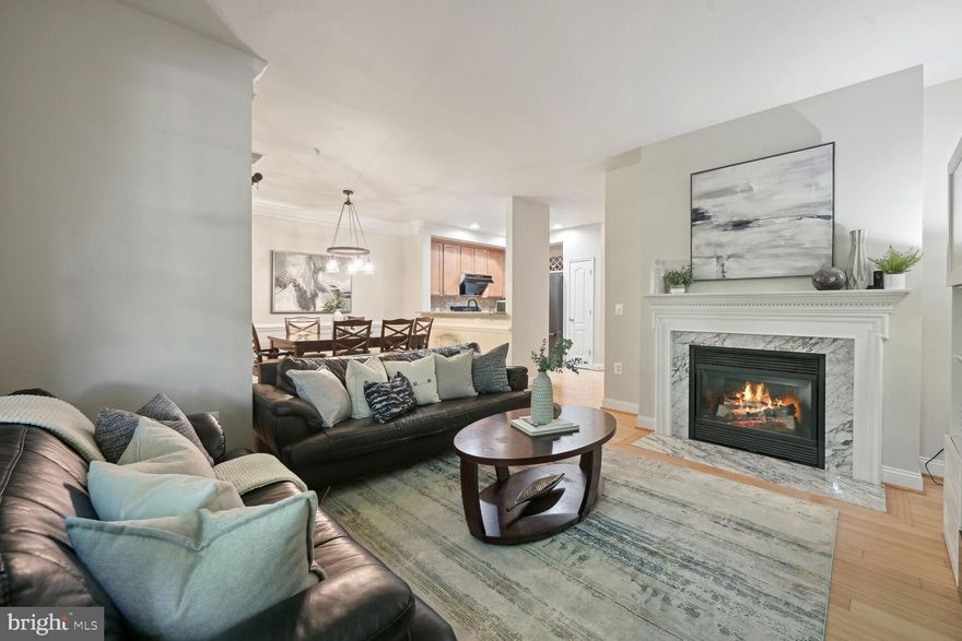 This Fabulous First Floor King Farm Condo offers two Extra-large Bedrooms, Two Full Baths, Primary ensuite, Living/Dining room combo, breakfast bar, 42"kitchen cabinets, 9’ ceilings, Granite, crown molding, chair rail, recessed lighting, Gas Fireplace, Hardwood Floors, Full Size Washer & Dryer in separate laundry room, Private Patio, Detached Garage. Newer HVAC, Newer Water Heater, New DIshwasher. All this in a secure building! ASSUMABLE 3.25% MORTGAGE! Separately deeded Garage Fee is 55.53/month.

Don’t miss out on this amazing opportunity to live in style and comfort in one of the most desirable communities around! King Farm is a planned community located in the city of Rockville, Maryland, designed with walkability in mind. Many residents appreciate the ability to walk or bike to the many nearby amenities. The King Farm Community Center includes a fitness center, meeting rooms and game room. King Farm has two pools, each with a children’s pool, beach entry and lap lanes. There are playgrounds and tot-lots throughout the community as well as tennis courts, several parks, dog park, green spaces, and a network of trails and paths including the King Farm Connector Trail which connects King Farm to the Rock Creek Trail. King Farm is located close to major commuting routes and the community operates a shuttle bus to the Shady Grove Metro Station. The active community association organizes events and activities throughout the year including a farmers’ market, holiday events and movie nights. The King Farm Village Center features a grocery store, restaurants, shops and services. Living in King Farm gives you the best of everything!