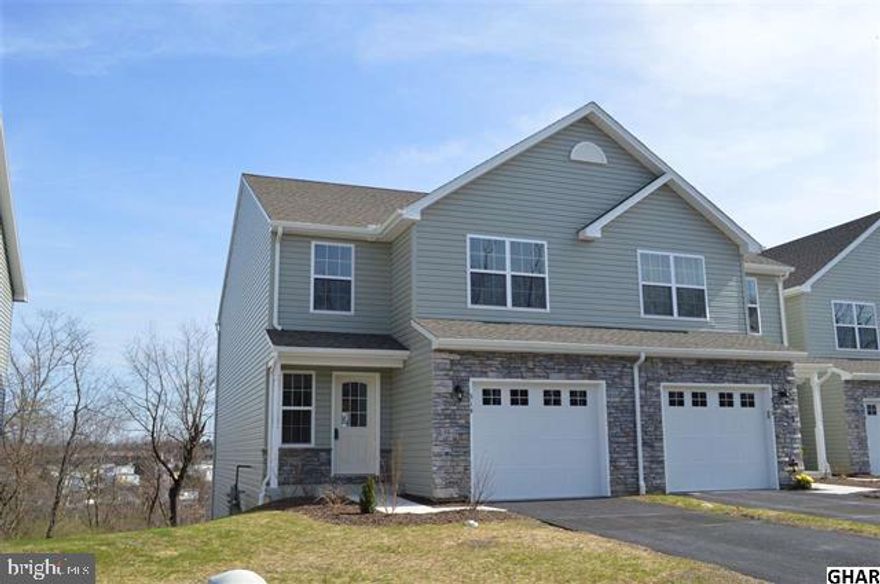 Brand new 3 bedroom 2.5 bath End Unit townhome with a finished walk out basement and a 1 car garage! Home back up to open space for extra privacy and is located at the end of a cul-de-sac! The home is conveniently located to the new Pinnacle Health, Capital Blue Cross, and Holy Spirit Hospital. Excellent public park (Adams Ricci) located nearby with walking trails, lighted tennis courts, basketball and volleyball courts, picnic pavilions, and playsets! New Front Load Washer and Dryer in Unit!