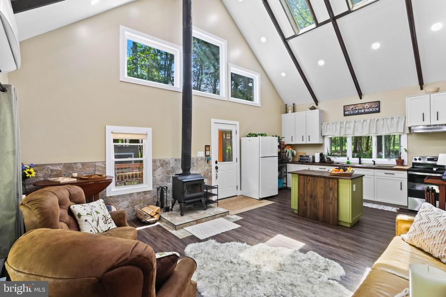 Beautifully renovated and ready to roll. This 3 bedroom, 1.5 bath chalet sits on an oversized lot just a short walk to the beach in Stillwater Estates. Outside you'll love the screened in gazebo complete with electricity overlooking the side yard that is frequently visited by wildlife. Inside this home was taken back to the studs and completely updated with a new layout, perfectly suited for vacations, or short term rental use. New windows, insulation, floors and more. Comes furnished. Ask how to receive a $3,000 lender credit towards closing costs or lowering your interest rate!