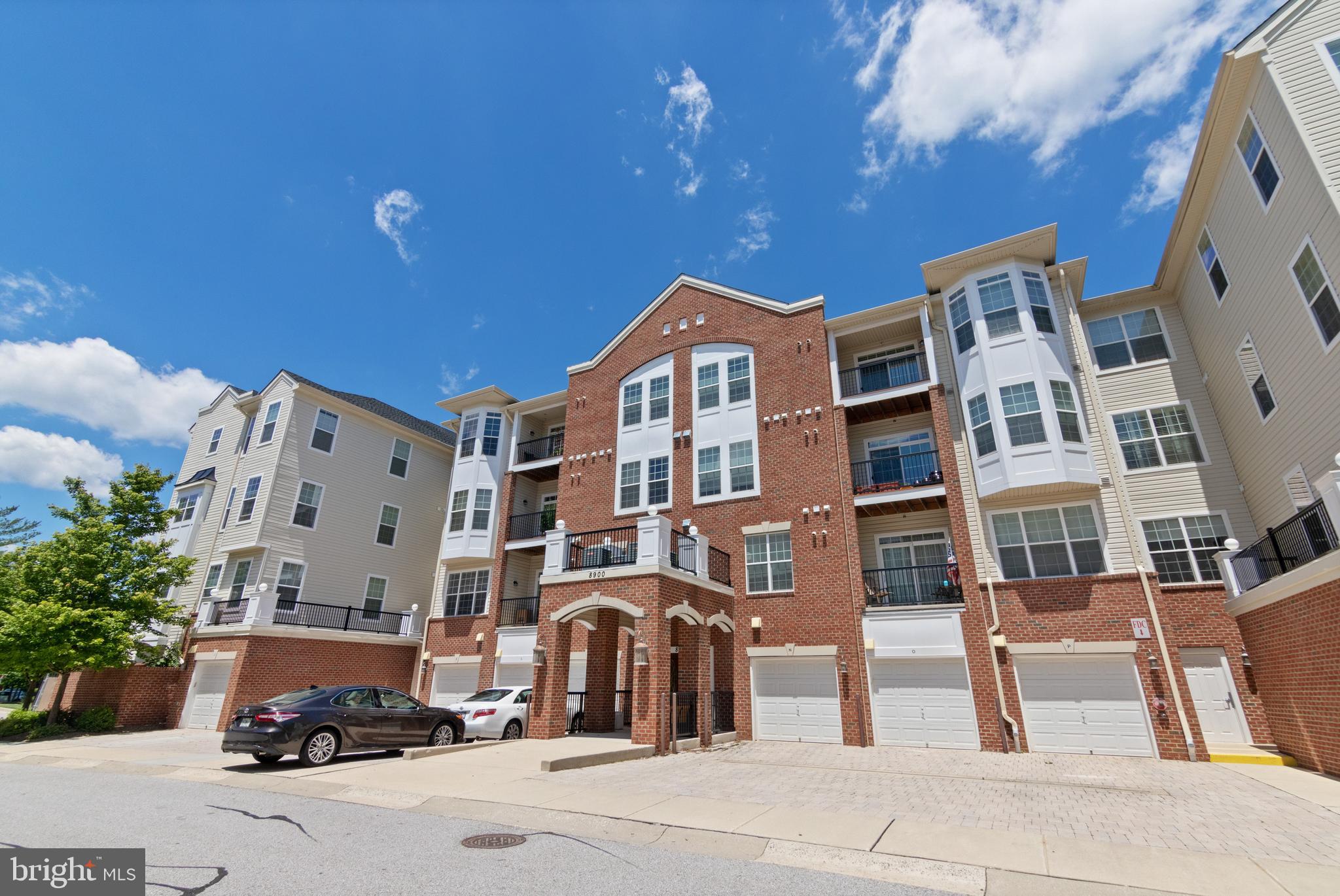 FANTASTIC 55+ Community in the heart of Ellicott City with shopping, restaurants, award winning library and charming Old Ellicott City just minutes away! ENJOY this home's location from the private balcony which backs to trees! These original owners selected most ALL of the UPGRADES available in this spacious & desirable 3 bedroom home including hardwood floors, granite counters, stainless appliances, upgraded cabinets, light fixtures, decorative columns & trim, carpets, AND MORE! 1 car, attached garage offers additional storage and rest assured, there is parking for additional cars as well!