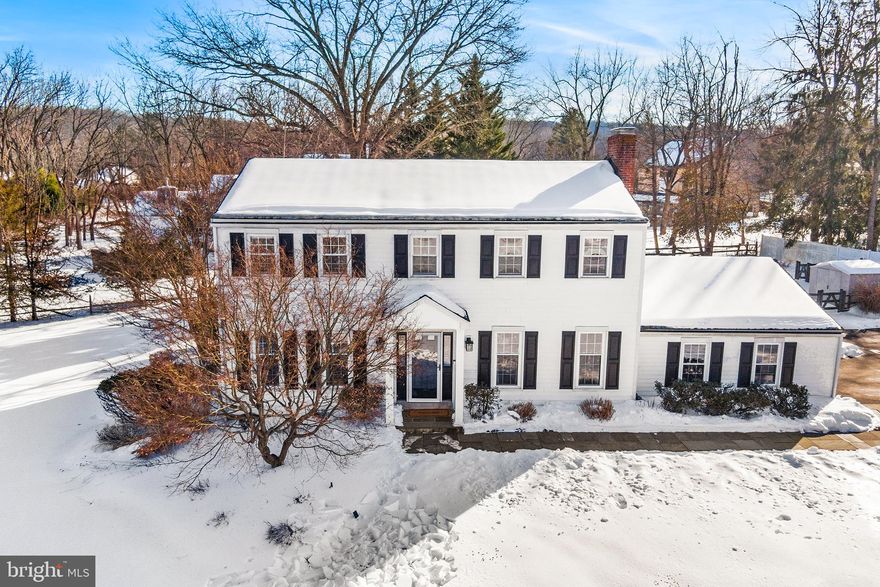 This is it — the Colonial you’ve been waiting for!
Set on a large, level lot overlooking a picturesque 5-acre farm with beautiful stone structures, this exceptional home offers timeless charm and scenic views at every turn.
From the moment you step onto the flagstone walkway, you’ll appreciate the style and space this home provides. The welcoming foyer features a gracious staircase, coat closet, and powder room. The spacious living room includes a gas fireplace and hearth and opens seamlessly to the updated gourmet kitchen, complete with stainless steel appliances, ample pantry storage, and a double sink overlooking the rear deck and fenced yard.
Just beyond, a sun-filled family room — surrounded by windows and sliding glass doors — provides access to the deck and doubles as an expansive dining area, perfect for entertaining. The thoughtful first-floor layout also includes a private office and mudroom off the oversized two-car garage, with abundant storage throughout.
Upstairs, a generous landing offers flexible space for a homework area and access to a convenient laundry closet. The primary suite features a large walk-in closet with organizers and an expansive bath with skylight, double vanity, and shower. Three additional bedrooms are well-sized for family or guests, and the hall bath includes a double vanity and tub/shower combination.
The full lower level is partially finished, providing additional living and/or entertaining space, plus an unfinished workshop, utility, and storage area. Outside, enjoy the timeless, low-maintenance deck with lighting and stairs leading to the secluded backyard.
Simply put, this is an incredible home offering comfort, character, and lifestyle — ready for its next owner to move in and make it their own.
