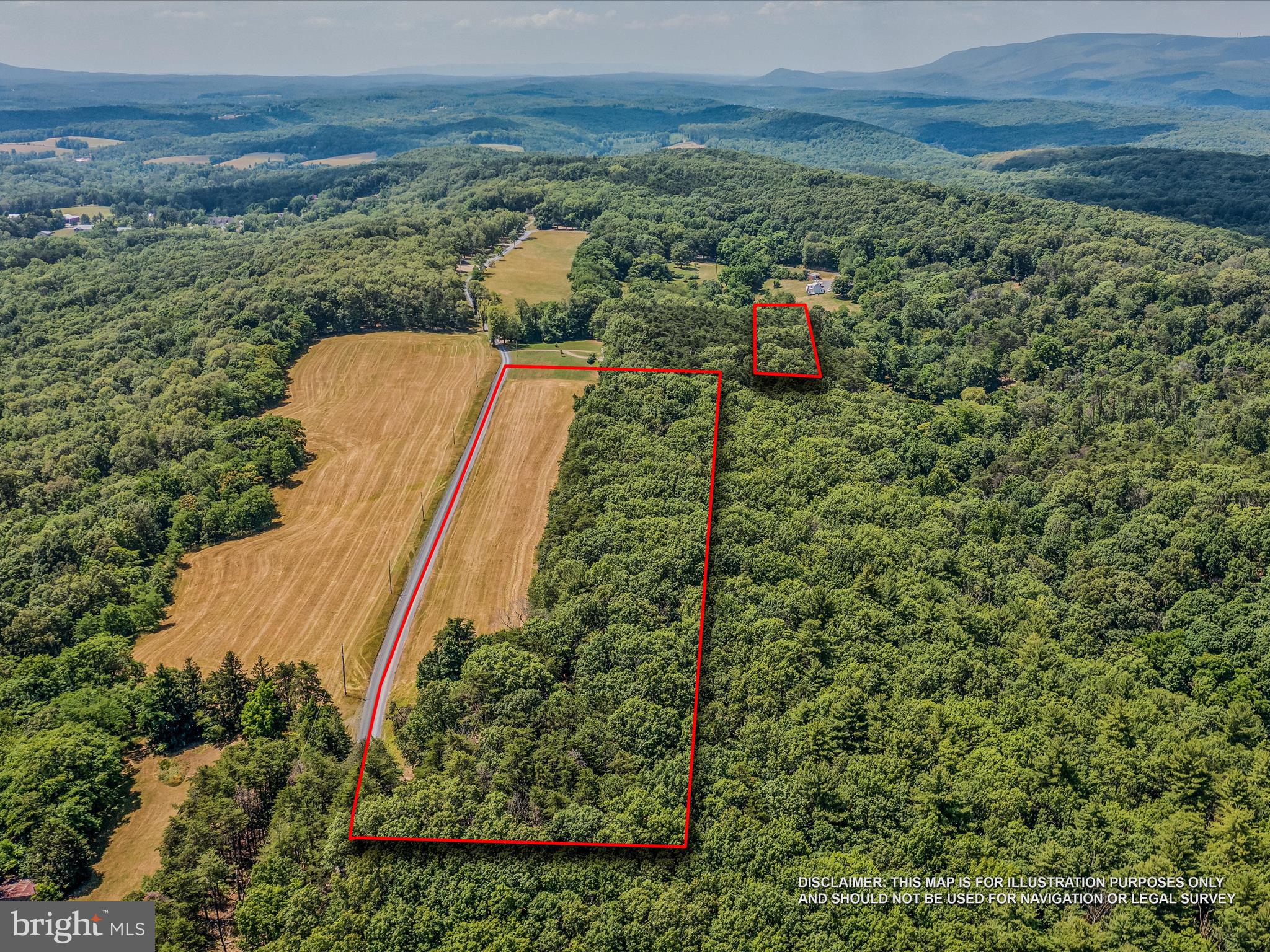 Embrace the serenity of Libby's Ridge with this rare opportunity to own 9.8+/- acres of pristine land in a coveted location known for its views and tranquil setting. This expansive property consists of a 9.35-acre parcel offering limited mountain vistas, ideal for building your dream home. Adjacent is a 0.50-acre lot overlooking a neighboring pond, perfect for creating a quiet retreat spot or campfire ring.
Minor protective covenants ensure the preservation of the area's natural beauty, while the land's current use for hay farming results in low taxes and assessments. Whether you envision crafting a secluded homestead in the heart of nature or dividing the property to share with loved ones, Libby's Ridge could be your dream property!
PROFESSIONAL AERIAL AND VIDEO TO FOLLOW