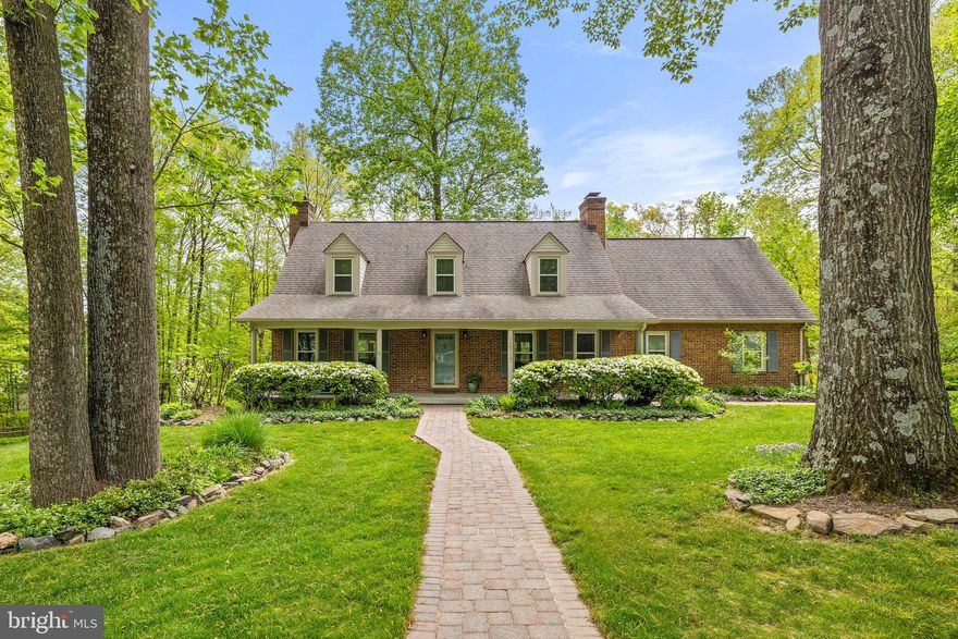 Welcome to your PRIVATE RETREAT, nestled on a .71 acre lot in sought-after Oakwood Estates within Fairfax's Greenbriar community. As you arrive, the custom paver walkways and lush landscaping guide you to the inviting front porch. METICULOUSLY UPDATED, this 5BR/3.5BA home boasts a STATELY brick exterior and an oversized 2-car sideload garage. Around back, discover your BACKYARD OASIS, featuring a large maintenance-free deck overlooking the HEATED IN-GROUND POOL ('10). Step into the welcoming Foyer with designer tile flooring. GLEAMING HARDWOOD floors extend throughout the Main & Upper Levels! The spacious Dining Room boasts a custom BUILT-IN WINDOW SEAT, crown moulding, and recessed lighting, seamlessly connecting to the RENOVATED Chef's Delight Gourmet Kitchen ('10). With handcrafted 42" raised panel cabinets, a CENTER ISLAND, granite & silestone countertops, under/up cabinet lighting, and upgraded appliances (KitchenAid dishwasher '20/JennAir range with convection oven '21/Samsung refrigerator), your Gourmet Kitchen opens to the deck through SUNLIT French doors ('12). The Living Room, with its cozy WOOD-BURNING FIREPLACE and sun-filled windows, smoothly transitions to the Family Room through functional pocket doors, where another fireplace adds warmth and french doors ('12) lead to the backyard retreat. Additionally, the Family Room provides access to both the main level Laundry/Mud Room and Garage for added convenience. Ascend the HARDWOOD STAIRS with an updated bannister ('08), and enjoy the SOARING CEILING and large window offering picturesque views. Enter your spacious Owner's Suite, featuring hardwood flooring, two large WALK-IN CLOSETS, a built-in window seat, and a Sitting Room (also suitable as a 5th Bedroom or Nursery). The UPDATED Owner's Bath ('18), fully accessible, showcases designer touches such as trendy tile flooring, an OVERSIZED SHOWER with built-in sprayers, a seamless glass enclosure, and tiled floor/surround. It also features vanities with GRANITE countertops and a built-in linen cabinet. The additional Upper Level bedrooms, generously sized, feature gleaming hardwoods and large closets. Descend to the FINISHED LOWER LEVEL boasting a sun-drenched WALKOUT ELEVATION. The expansive Recreation Room features a wood-burning fireplace, recessed lighting, built-in surround sound (conveys), neutral carpeting, and ample storage closets. Additionally, discover a Den/6th Bedroom and another versatile Den, perfect for a Home Office or Exercise Room, with a Full Bath featuring a separate shower and NEW LVP flooring ('24) completing this level.**UPGRADES GALORE: Remodeled upper level Full Bath with NEW vanity ('24), water heater ('22), updated HVAC--BOTH Zones ('21) with UV light purification system ('21), replaced roof ('07), electric panels upgraded with increased capacity ('19), replaced garage electric panel ('22), installed windows ('12), improved attic insulation ('18), replaced toilets ('22), garage door opener ('21), gutter guards ('19), newer pool filter motor ('22), fresh neutral paint, upgraded exterior lighting, and more! Conveniently located near MAJOR commuting arteries, Fair Oaks Hospital and tons of shopping including Fair Oaks Mall, Fair Lakes Shopping, Greenbriar Shopping Center & Fairfax Corner!  Enjoy the nearby Rocky Run Stream Valley trail on a beautiful day or consider joining the Greenbriar Pool Club and/or Greenbriar Civic Association. TRULY a MOVE-IN ready home--make it YOUR home! **Be Sure to Check Out the Video & 3D tours!**