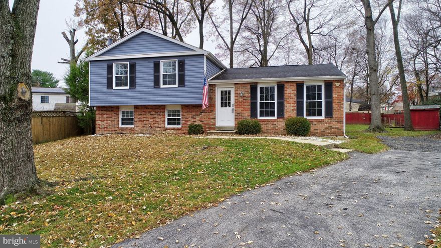 Professional photos to come on Friday! Welcome home to this beautifully updated 4-bedroom, 3-full-bath residence tucked away in a serene cul-de-sac neighborhood in Howard County. Freshly painted throughout in a modern, neutral palette, this home impresses from the moment you enter. Gleaming cherry hardwood floors span both the main and upper levels, adding warmth and elegance to every space. The gourmet kitchen is a true centerpiece, featuring an expansive island with abundant seating, granite counters, recessed lighting, and a large pantry. The open-concept main level boasts vaulted ceilings, wonderful natural light, and a TV that conveys. A sliding door leads directly to the backyard for seamless indoor-outdoor living. The lower level offers incredible additional living space with a huge family room anchored by a cozy wood-burning fireplace. You’ll also find a versatile den/office, a full bathroom, storage closets, and a dedicated laundry room. Walk-up access leads to the backyard. Step outside to a spacious yard complete with a shed, trampoline, garden space, and plenty of room to entertain, play, or simply relax. Move-in ready and perfectly located—this is the one you’ve been waiting for!