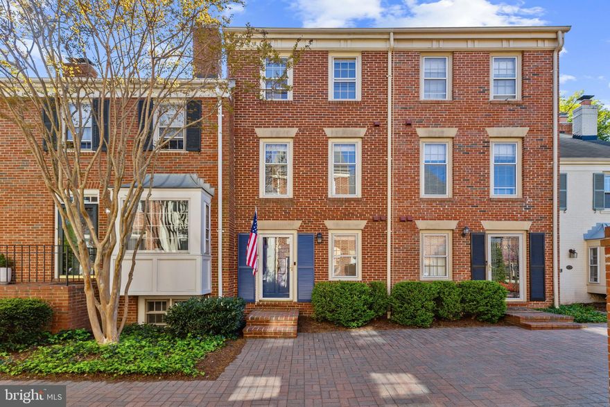 Welcome to 824 Bashford Lane, an elegant townhome in Old Town's coveted Nethergate community.
Located in a peaceful courtyard, this four-level townhome offers over 1,900 square feet of refined living space. With two bedrooms, a versatile lower-level den, and welcoming outdoor patio, this home blends timeless charm with modern luxury—all walking distance to endless amenities.

The main level is designed for both relaxation and entertaining, featuring a sunlit living room with custom built-ins, a wood-burning fireplace, and elegant French doors that lead to a fully fenced brick patio—ideal for al fresco dining or a serene morning coffee. A stylish powder room, generous coat closet, and walk-in laundry room complete this level. The heart of the home is the gourmet kitchen, with white quartz countertops, premium stainless-steel appliances, and an abundance of cabinetry. A rare second wood-burning fireplace adds an inviting ambiance to the adjoining flexible space—perfect as a formal dining room, cozy den, or an extension of your entertaining area. 

Upstairs, the primary suite impresses with vaulted ceilings, a custom-designed closet, and en-suite bath. The spacious second bedroom is bathed in natural light and offers a full wall of closet space, complemented by a beautifully appointed hall bath.

The fully finished lower level extends the home’s versatility, offering a second family room or recreation space, a second full bath, and a generous storage area. Perfect for a media room, guest retreat, fitness studio, or home office.

Additional features include recently refinished hardwood floors on three levels, new carpet in the lower level, sophisticated crown molding, designer lighting, and fresh neutral paint throughout. This home also includes 2 offer street parking spaces and 200+ square feet of pull down attic storage.

The HOA Fee of $832 a quarter includes: Common area maintenance, Front yard lawn, Parking, Snow removal, Trash  and recycling removal, Road maintenance, Reserve funds, Water/Sewer.  You pay only your electrical bill and cable/internet!

Enjoy unparalleled convenience with Old Town Alexandria’s acclaimed shops, restaurants, and waterfront parks just moments away. Trader Joe’s, Harris Teeter, and two Metro stations—Braddock and Potomac Yard—are within a mile, while Reagan National Airport, the Pentagon, National Landing, and the GW Parkway are just a short drive. All of this, just two stoplights from D.C., and within walking distance of the vibrant new offerings in North Old Town.
