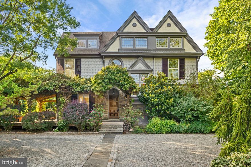 Welcome to 529 East Gravers Lane in Wyndmoor! We are excited to offer this truly spectacular property, built circa 1888 in the Victorian style. Move right in to this outstanding stone and shingle residence, beautifully sited on .52 acres with rare access on both Gravers and Spring Lanes. The first floor features a brightly lit, gracious floor plan with exquisite architectural details and moldings, meticulously and lovingly maintained. A gracious center hall with handsome staircase and fireplace is a warm welcome for family and friends. Continue on to the formal living and dining rooms with fireplaces and a cozy library with built-in bookcases. The gourmet kitchen/family room is an absolute knockout; featuring Viking, Thermador and Kitchen Aid appliances, custom cabinetry, Corian countertops and island. Family room addition designed by Lynch Martinez Architects and built by Henry Heist. An ample mudroom and powder room complete the ideal setup for every day living. Upstairs, in addition to a spacious primary suite with laundry, two floors of comfortable living spaces include bedrooms, baths, office and storage.  Outside, enjoy a fabulous wrap around porch just begging for a party. Current owners have created an outstanding “Green Oasis” with mature specimen plantings. This is a wonderful opportunity to enjoy an exceptional lifestyle, in a private setting, within walking distance to both Wyndmoor and Chestnut Hill Villages, schools, parks, transportation and the Wissahickon Valley trails. Easy commute to Philadelphia and a 90 minute drive to Manhattan.