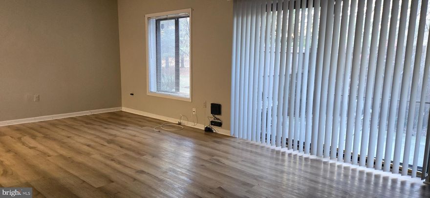 Move in ready!! Very spacious unit with enclosed private patio terrace. Fresh paint, laminated floors, ceramic bath floor, newer HVAC, stack washer/dryer, galley kitchen, new light fixtures, large walk in closet. ALL utilities included. Enjoy the fitness center, swimming pool, tennis court, and picnic areas. Located in a spectacular sought after neighborhood, and on bus line. Convenient to Greenway Shopping Center, restaurants, Beltway Plaza Mall, and Greenbelt Metro.  Near recreational parks, walking, and bike trails. Minutes to Baltimore / Washington Parkway, 495 Beltway, and University of Maryland. Short commutes to DC and Baltimore. Shown by appointment. FHA approved.