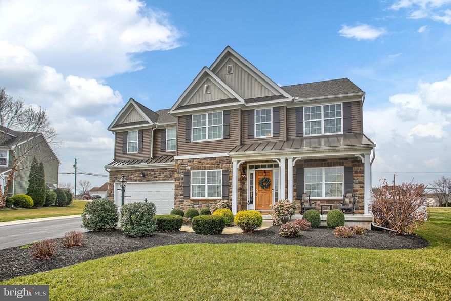 Don't miss the opportunity to own this beautifully appointed home in Addington Reserve!  This formal model home features a ton of upgrades with hardwood floors throughout the first floor, an Eat-In Kitchen with Corian Counters and Stainless Steel Appliances that overlooks a large Family Room with a stone-fronted gas Fireplace.  The formal Dining Room features a Tray Ceiling with in-lay lighting, crown molding and wainscoting and leads to the formal Living Room and a separate office/playroom.  The roomy Master Bedroom Suite is a dream with vaulted ceilings, two Walk-In Closets and an attached master bathroom  with a massive walk-in shower.  Finally take some time to relax outdoors on one of the two patios in your fully fenced backyard.  This home is a must see to appreciate all it has to offer!