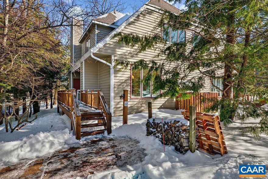 Completely renovated and move-in ready townhouse at Wintergreen Resort with a modern interior and a highly desirable central location. Hardwood floors throughout and fresh interior paint were completed in 2025, creating a bright, updated feel. Major upgrades between 2018?2020 include replacement of select windows, a fully conditioned crawlspace, a high-efficiency Trane HVAC system with remote programmable thermostats, and granite countertops in the kitchen and baths. The dishwasher and washer/dryer were replaced in 2024, while the oven/microwave and refrigerator are brand new and have never been used. Roof replaced in 2011. This 2-bedroom, 2.5-bath floor plan offers an open main level with a spacious kitchen flowing into the dining area and living room with a wood-burning fireplace, plus a convenient half bath. Upstairs are the primary bedroom with en-suite bath and a guest bedroom with its own full bath. Enjoy a large deck backing to a generous wooded area, offering privacy and a peaceful setting. Ideally located across the street from the Wintergarden Spa & Aquatics Center, next door to the Nature Foundation, and within walking distance to Highlands ski slopes and Fire & Frost Bakehouse. Very attractively priced for a quick sale,Granite Counter,Oak Cabinets,Fireplace in Living Room