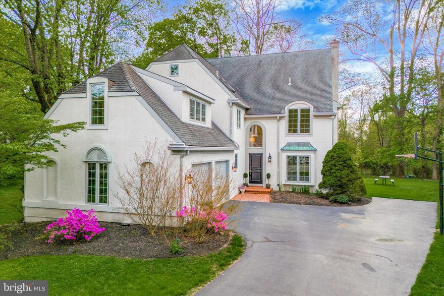 Welcome to 118 Trianon Lane, a stunning residence nestled at the end of a private cul-de-sac in the prestigious Villanova neighborhood, boasting exquisite features throughout. As you step inside, you are greeted by the magnificent two-story foyer and French doors leading into the first of two private offices. The formal living room, adorned with a gas fireplace and sliders, opens seamlessly onto an expansive back deck, perfect for entertaining. Bathed in natural light, the formal dining room and family room, featuring a brick fireplace, provide wonderful gathering spaces. Step into the inviting enclosed porch, surrounded by windows, offering an ideal spot to unwind and soak in the beauty of the surroundings. The kitchen is equipped with an island, breakfast area, wall-mounted double oven, paneled refrigerator, and a charming coffee nook. Completing the first floor is an updated half bath and a conveniently located laundry room with access to the two-car garage. On the second floor you will find the expansive primary suite, offering two walk-in closets, a second private office, and an ensuite bathroom complete with double vanity, soaking tub, and separate shower. Four additional bedrooms and two hall baths provide ample space and comfort for family and guests. The lower level boasts a large, finished basement where you will find a secondary living area, along with a separate room currently utilized as a gym and full bathroom. The entire house is supported by a back up generator. Step outside to the beautifully manicured yard, surrounded by mature trees, creating a private oasis for relaxation and outdoor activities. Situated in the award-winning Radnor Township school district, residents of 118 Trianon Lane enjoy proximity to shopping and dining in Wayne and Bryn Mawr. With easy access to the train station as well as Lancaster Ave and I-76, commuting to Philadelphia and New York City is a breeze, making this residence an exceptional blend of luxury, convenience, and comfort. Don't miss the opportunity to make this exquisite property your new home!