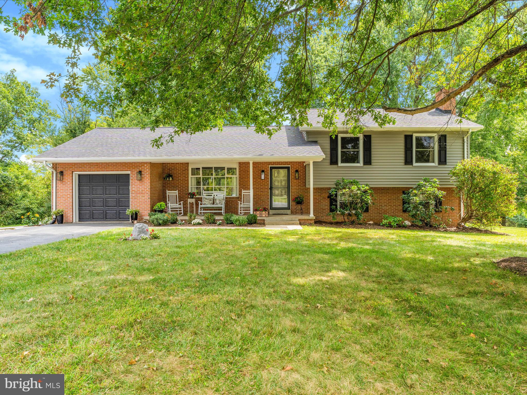 Tucked away on a quiet cul-de-sac in sought-after Middletown, this split-level home sits on a private 2.7-acre lot and has been extensively updated inside and out. Since 2018, nearly every major feature has been improved, giving you peace of mind and modern comfort.
Updates include: new roof and siding (2021), enclosed carport with added mudroom (2021), remodeled kitchen (2019), primary bath renovation (2022), new patio (2023), water heater and water softener (2025), plus septic pumped in 2023. All flooring throughout the home has been replaced, every bathroom has new vanities and toilets, recessed lighting added in the living room and laundry, and all appliances updated. A 12 x 24 shed (2018) adds extra storage.
The layout offers multiple living areas, a refreshed kitchen, and bright bedrooms, with thoughtful finishes that make the home move-in ready. Outdoor living is a highlight here with a screened-in porch, front porch, and oversized patio—perfect spots to relax and take in the private, wooded backdrop.
Living in Middletown means more than just a house—you’ll love the community feel, local parks, Main Street dining, shops, and historic charm, all just minutes away with easy access to commuter routes.
This home blends lifestyle, location, and updates you won’t find often—schedule your showing today.