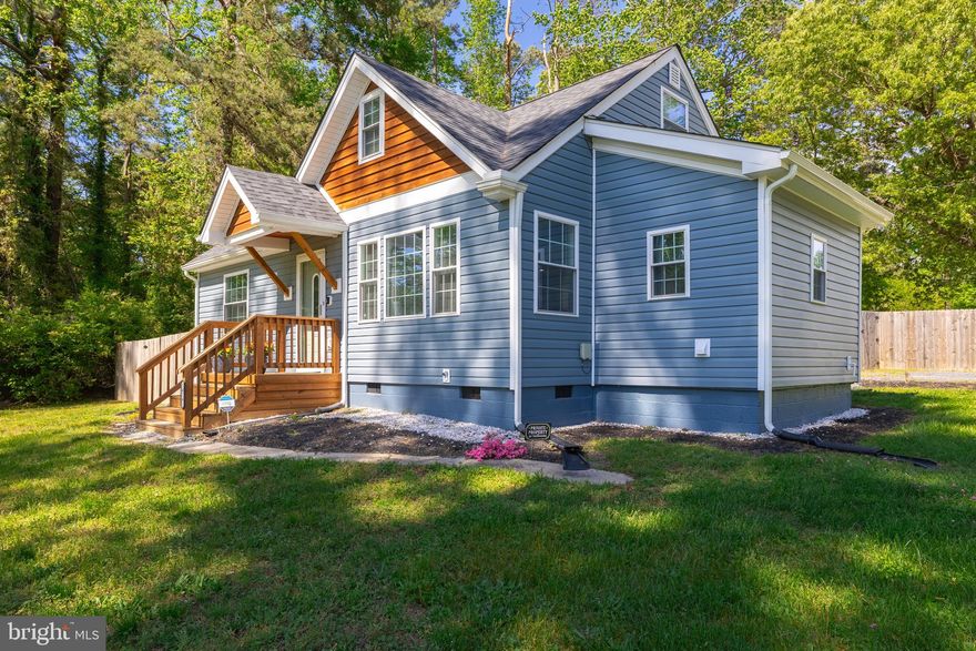 This home is being sold with design services included with Reality Staging! If you see a photo with the watermark Reality Staging all of the furniture and design features are available to purchase so you can make the room just as beautiful for you in your new home!
Get ready to make memories galore in this enchanting home in Chester, where every nook invites laughter, cookouts, and cozy sleepovers! Step into this completely renovated classic Cape Home, featuring all the modern flair while preserving its timeless charm. This means you have peace of mind with a new roof, new windows, siding, and even the water heater. No detail was overlooked! The living room is your ultimate comfort zone, where giggles fill the air and relaxation reigns supreme. With an open floor plan leading to the eat-in kitchen, equipped with granite countertops, stainless steel appliances, including a beautiful new refrigerator (Yes! It conveys!) and even a wine rack for those impromptu celebrations, your inner chef will be in paradise. Downstairs, discover two bright bedrooms, a handy laundry room with a washer and dryer that convey (complete with a utility sink, because convenience is key), and a full guest bath featuring ceramic tile that'll make you feel like you're stepping into a spa. Ascend the staircase to find the primary bedroom, a lavish sanctuary with its own ensuite, a cozy sitting area, and a walk-in closet spacious enough to house all your fashion treasures. The real magic happens outside, where the fun truly begins! Park up to four cars with ease, then kick back on the back porch with a glass of sweet tea and relax in your private oasis. The yard, freshly landscaped and generously fenced-in, is the perfect playground for your furry friends to frolic. Only 5 minutes from the convenience of Chester Center with the tranquility of a rural setting. This home isn't just perfect for anyone—it's perfect for you. So why wait? Come see for yourself and start imagining all the unforgettable moments waiting to be made!