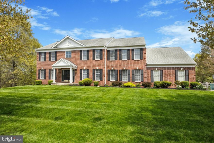 Welcome to this stately brick Colonial home in the highly sought-after Brandywine River Estates, a family-friendly neighborhood nestled in the heart of Chester County. Located in the esteemed West Chester Area School District, this lovely residence offers the perfect combination of comfort, style, and convenience.

This beautiful, spacious 4 Bedroom, 3.5 Bath home is situated on a premium lot adjacent to dedicated open space on both the rear and the west side, creating a feeling of wide open spaces and affording gorgeous nature views. The flowing, open floor plan boasts front and back stairways with natural light flowing throughout. The grand foyer is adorned with an elegant curved staircase, with detailed, beautiful crown molding and wainscoting throughout. The spacious, well appointed Living and Dining Rooms have custom trim packages. The generous, sunlit family room boasts a wood burning fireplace and is open to the built in wet/dry bar area and large eat-in kitchen with an island, pantry and desk area. Relax and enjoy the large sunroom off of the kitchen that exits to the expansive deck and patio, which overlooks the large fenced in yard perfect for entertaining and family gatherings. The spacious play room/office off of the kitchen and the powder room complete the first floor. The second floor features a large primary suite, sitting room. double, walk in closets, plus an additional flex room (exercise, office, hobby space) and primary bath. Two, generously sized bedrooms share a Jack and Jill bathroom, and the fourth bedroom is a Princess suite with a private bath and large walk in closet. All bedrooms are bright and sunny and boast great closet space and views. 

The 3 car garage and the full daylight/walkout basement provides plenty of room for storage and additional living space, if desired. Two zoned heat and AC (new in 2019 and 2021) add increased comfort and efficiency to the functionality. Meghan Ct is a cul-de-sac street, with low traffic volume for children’s play, and plenty of serenity. 

Brandywine River Estates is known for its family-friendly environment and strong sense of community. The neighborhood is conveniently located near East Bradford Park and the beautiful Brandywine Creek, offering ample opportunities for hiking, biking, and enjoying the natural beauty of Chester County. With quick access to major highways, this home also provides an easy commute to the Philadelphia International Airport and downtown West Chester, with its charming shops, restaurants, and cultural attractions. Welcome Home!