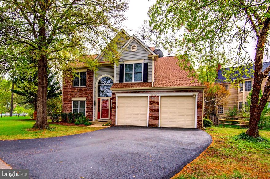 *** Open house this Sunday April19th from 1-3 PM *** Don’t miss this charming 4-bedroom home in the highly desirable Cascades community! This inviting property features a bright, sun-filled kitchen with a center island, pantry, and a refrigerator with an ice and water dispenser, plus a cozy breakfast nook. Elegant French doors lead to a beautiful brick patio—perfect for relaxing or entertaining guests. The home welcomes you with a stunning two-story foyer and offers four spacious bedrooms. Enjoy the warmth and style of hardwood flooring throughout the kitchen, family room, hallway, and foyer, along with a cozy fireplace for added comfort. Recent updates include a newer HVAC system and a newly installed front door with elegant leaded glass, enhancing the home’s curb appeal. Upstairs, the expansive primary suite boasts two walk-in closets and a luxurious en-suite bathroom featuring a soaking tub and new ceramic tile. With abundant storage and thoughtful updates throughout, this home offers the perfect blend of comfort, style, and convenience in a fantastic location.