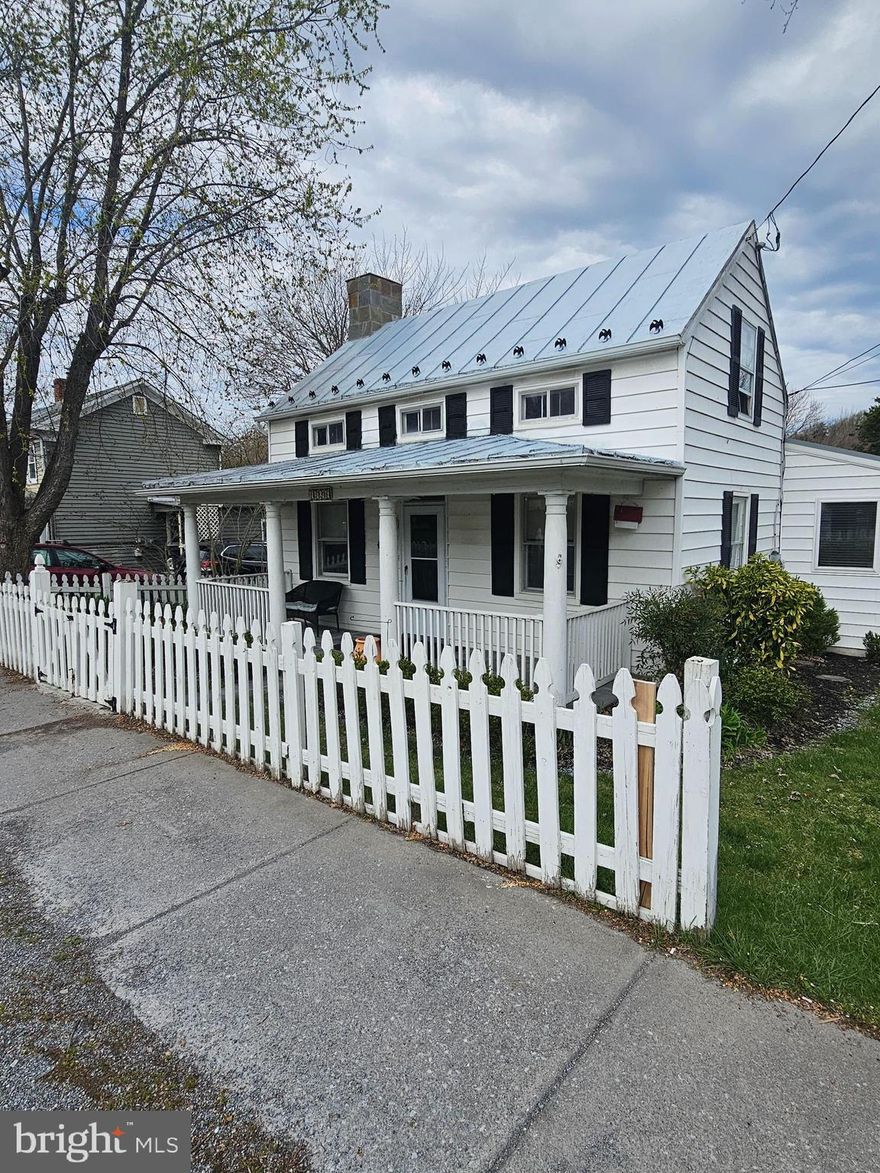 Quaint and charming home located in the heart of Bolivar.  Main level offers living room and dining room with hardwood flooring, fully equipped kitchen with pantry, bedroom with sitting room, full bath and large mudroom/laundry room.  Upper level offers bedroom with sitting room.  Full, covered front porch and nice backyard with slate patio.