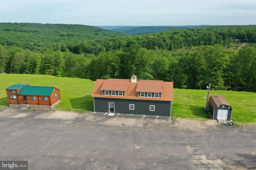 Calling all outdoor enthusiasts! Welcome to a truly unique and expansive opportunity in the heart of Schuylkill County! Spanning approximately 1,341 acres, this exceptional property is composed of seven parcels that together offer unparalleled natural beauty and serenity. At the heart of the property, you will find two picturesque ponds and a charming, secluded tiny house. Measuring 13’x32’, the tiny house features two cozy bedrooms, a versatile loft space, a full kitchen, an inviting eat-in dining area, and a full bathroom, providing a comfortable and intimate retreat. Adjacent to the tiny house, there is a substantial 24’x48’ garage or bunkhouse, built with robust 2”x6” construction, ready to be customized to your specifications. The property is well-equipped with modern amenities, including water service, a sand mound septic system with a 1500-gallon holding tank, and both 200 amp and 400 amp electric services. For the nature enthusiast, this property is a paradise. Abundant wildlife, including deer, bear, and turkeys, roam freely across the land, offering endless opportunities for observation and hunting. The well-maintained road and trail networks allow for easy exploration of the entire property, while the 100, 200, and 300-yard shooting ranges cater to shooting sports enthusiasts. The seller and neighboring parcels practice Quality Deer Management (QDM), ensuring a sustainable and healthy wildlife population. Motorcycle and ATV enthusiasts will find this property particularly appealing, with miles of trails winding through the landscape, providing thrilling rides and endless adventures. This extraordinary property must be seen to be truly appreciated. 
Oil, Gas & Mineral Rights are owned by a previous owner.
Don’t miss the chance to own a piece of paradise in Schuylkill County!