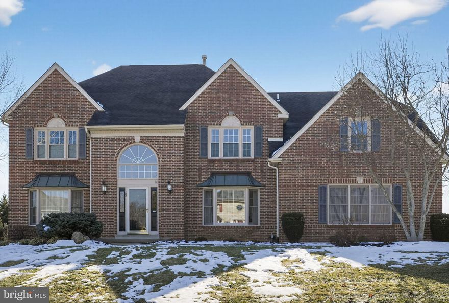 Perfectly positioned and located in the highly sought-after Gwynedd Lea community of Montgomery Township, 102 Clover Leaf Lane is an impressive two-story home blending classic architectural elegance with generous living spaces. Its stately full front brick façade boosts curb appeal and features a grand entrance framed by overhead transom and fanlight elliptical windows, creating a striking first impression. Two bay windows with copper pent roofs flank the entryway also add to the prestige. Inside, natural light fills the two-story foyer, which features hardwood floors, “window box” wainscoting and dual coat closets located beside the front door. Off the foyer the formal living room flows seamlessly into the dining area, making it perfect for holiday gatherings. Opposite the foyer, a spacious office offers a great “work from home” solution, ideal for both entrepreneurs and executives. The large kitchen serves as the heart of the home, boasting a bright walk-in bay breakfast nook, extensive counter top space, and center island, modern appliances, oak cabinetry, tile backsplash, recessed light, serpentine track lighting,  hardwood flooring and a walk-in pantry. This area connects easily to the adjacent two-story great room, which features a floor to ceiling stone gas fireplace and a wet bar—ideal for kicking those shoes off relaxing and entertaining guests. Practical amenities include a back staircase, a main floor laundry room with laundry tub, wall cabinetry and access to the garage, which is located just off the kitchen. Completing the first floor is a convenient half bath. Upstairs, the primary suite serves as a true retreat, offering a spacious walk-in closet, tray ceiling and a luxurious updated en-suite bathroom with HEATED flooring, a soaking tub, separate shower, cathedral ceiling with skylight, and an extra-large double vanity. Additional bedrooms comprise a “princess, prince or guest” suite with its own full bath, and two bedrooms with a Jack-and-Jill setup—all with plush wall to wall carpeting, and ample closet space. Other highlights include, roof solar panel power providing economical electrical service  (gas and electric combined approx 178.00 per month WOW) an oversized elevated rear deck, a sizable unfinished basement offering flexible space for recreation, hobbies, or storage, and a two-car garage for secure parking. The location provides easy access to Routes 63, 202, 309, and the Turnpike, placing you near shopping destinations like Costco, BJ’s, Lowe’s, Home Depot, Montgomeryville Mall, several grocery stores, restaurants, and entertainment options. All in all this is a home not to be missed.

Floor plans provided are a helpful visual guide and offered as a courtesy. Please note that all dimensions and square footage are approximate; we encourage you to personally verify all measurements to ensure they meet your needs.